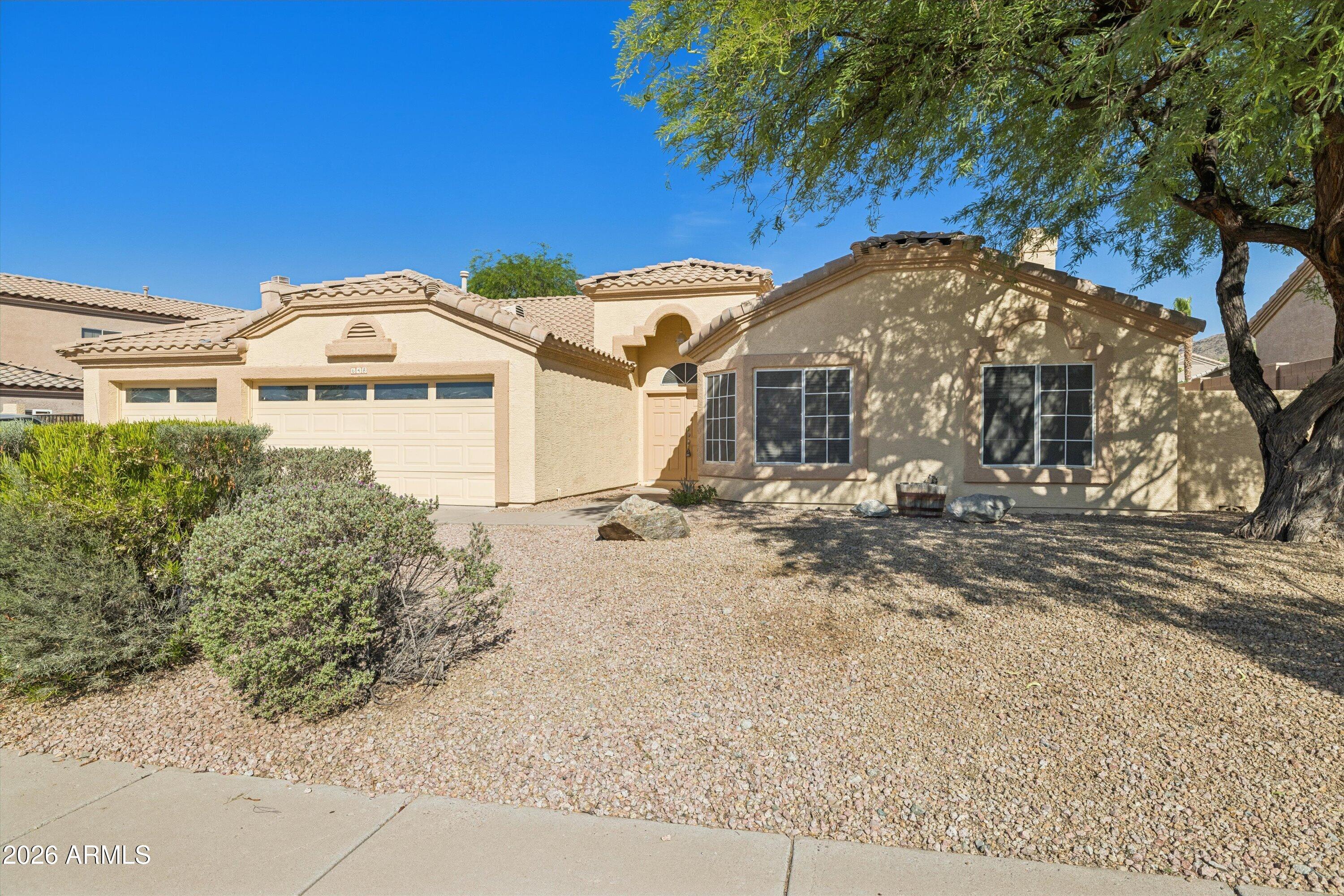 Perched in the prestigious Ahwatukee Foothills Club West, this beautifully updated home offers stunning mountain views and an inviting backyard with a sparkling pool. Boasting vaulted ceilings, a split master bedroom plan, and a covered patio, this residence combines comfort and style with desert-friendly easy-care landscaping.
Additional features include a fireplace, fans throughout, an RV gate, a spacious 3-car garage, and a kitchen with quartz countertops (2025) and 2025 GE appliances including a washer, gas dryer, fridge, and dishwasher.
Recent upgrades ensure peace of mind: new RO system, whole-house water softener, interior and exterior paint (2025), new LVP flooring throughout (2025), and an updated master bathroom shower.
Located in the Kyrene School District, close to freeways, shopping, dining, and outdoor activities, and just minutes from the golf course, this home offers the ultimate Foothills lifestyle!