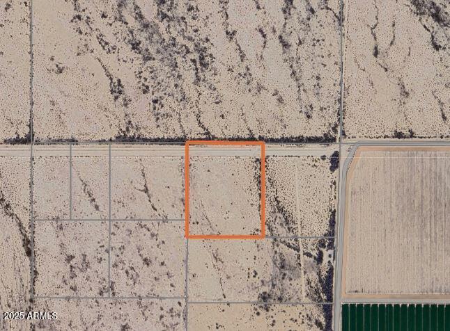 Great location to buy 12+ acres in the Harquahala Valley, just minutes from Interstate 10. This property offers excellent potential, whether you're looking for an investment opportunity to subdivide, a private setting to build your dream home, or space for a variety of uses. This parcel is not located in a flood plain. Electricity is located just north- across the street, making development more convenient. Just put in your well and enjoy! Also, great long term appreciation potential since it's located on the Glendale Rd alignment. Come see this gem and you will not be disappointed.