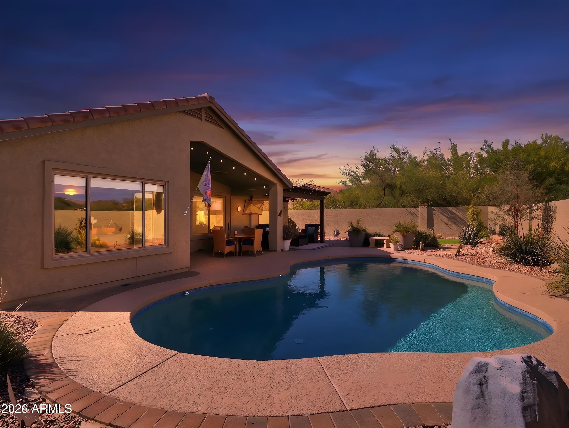 Meticulously Maintained and thoughtfully Upgraded home with Private Pool and beautiful Mountain Views in the desirable Superstition Foothills community of Gold Canyon. Located on a quiet, Premium Lot backing to Open Desert, this light and bright 3 Bedroom, 2 Bath home + Den/Office features a popular open concept floor plan. The home has been remodeled to include tile and plank flooring (no carpet), updated kitchen and baths - all with granite countertops - newer appliances, and fireplace in the main living area. Enjoy gently sunlit mornings from the East-facing private backyard with beautiful Mountain and Desert Views, mature trees, and peaceful desert surroundings. Notable updates include: New roof in 2019, fully renovated Salt Water Pool and Equipment in 2019, HVAC in 2016-serviced regularly, New Water Heater in 2025, Reverse Osmosis and Water Softener and oversized spacious garage with Mini Split and wall of Built-in Storage Cabinets and More! Full list of Home Features and Upgrades available.

This prime location, adjacent to nearby shopping, dining and everyday conveniences, offers added privacy with natural open space on one side and natural desert behind, creating a tranquil setting for outdoor living. Enjoy the best of Gold Canyon living in sought-after Superstition Foothills, a scenic desert community surrounded by the dramatic beauty of the Superstition Mountains. 

Superstition Foothills offers a relaxed Arizona lifestyle with natural beauty, recreation, and privacy--yet still within convenient reach of US 60 and the 202 Loop, Phoenix Sky Harbor and Mesa Gateway Airports, and local East Valley hotspots.

Residents enjoy a year-round Heated Community Pool and Spa, nearby Walking, Hiking and Biking trails, breathtaking Sunsets, peaceful desert surroundings, and star-filled dark skies that make this area feel truly special.  Located near Lost Dutchman State Park, Tonto National Forest, the scenic Apache Trail, and some of Arizona's most beautiful desert recreation, Gold Canyon offers endless opportunities for hiking, horseback riding, golf, photography, and outdoor adventure.