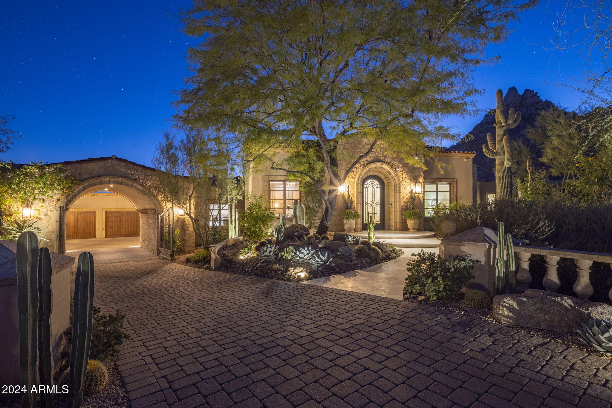 If you like to entertain, then look no further, this is the home you have been looking for!  Nestled in the prestigious guard-gated community of Estancia in North Scottsdale, this 5 bedroom, 6.5 bathroom home features unparalleled views of Pinnacle Peak. The owners spared no expense upgrading and transforming this exquisite estate into the true masterpiece that it is. Upon entering the grand foyer, you are greeted by soaring ceilings and an abundance of natural light that highlights the exquisite architectural details and bespoke finishes throughout. The expansive living spaces cater to both grand entertaining and intimate gatherings, seamlessly blending classic elegance with modern conveniences. The gourmet kitchen is a culinary masterpiece, equipped with new top of the line appliances, custom cabinetry, and a spacious island prefect for gathering around. Adjacent to the kitchen, the formal dining room sets the stage for hosting lavish dinners with family and friends.

The opulent primary suite is a private retreat, offering a tranquil escape with it's luxurious spa-like bathroom and generous walk-in closet. Additional bedrooms are equally well appointed, each featuring en-suite bathrooms and walk in closets, ensuring comfort and privacy for all.

Outdoor living is elevated to new heights with meticulously landscaped grounds, a sparkling heated swimming pool & spa, a putting green, an outdoor kitchen and a spacious covered patio that provides the ideal backdrop for entertaining. The property also features a state of the art home theatre and a detached casita complete with a kitchenette.

This stunning property embodies the epitome of luxury living, offering an unmatched lifestyle of elegance and comfort. It is truly a sanctuary where every detail has been thoroughly considered to provide a living experience that is second to none.
