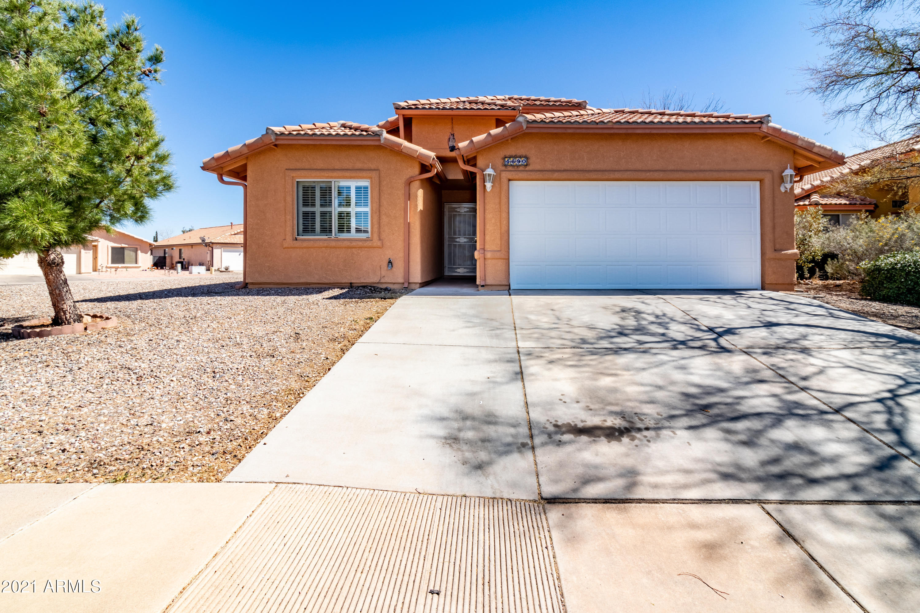 Beautiful move in ready home that you must see. Well maintained home located in a desirable neighborhood. Newer shutters have been install on all but four windows. Large open floor plan with a combine living room and dining room. Bay window in the living room. Spacious kitchen with two pantries and plenty of countertops and cabinets that looks into the living room. Split floor plan with a large master bedroom with a large walk in closet on one side of the home. Large master bathroom with a tub/shower. Hall bathroom and two other spacious bedrooms are on the other side of the home. Clean and low maintenance back yard. Home is located on a corner lot so there is plenty of yard on the side of the home. Call me today for a private showing before the sold sign goes up!!