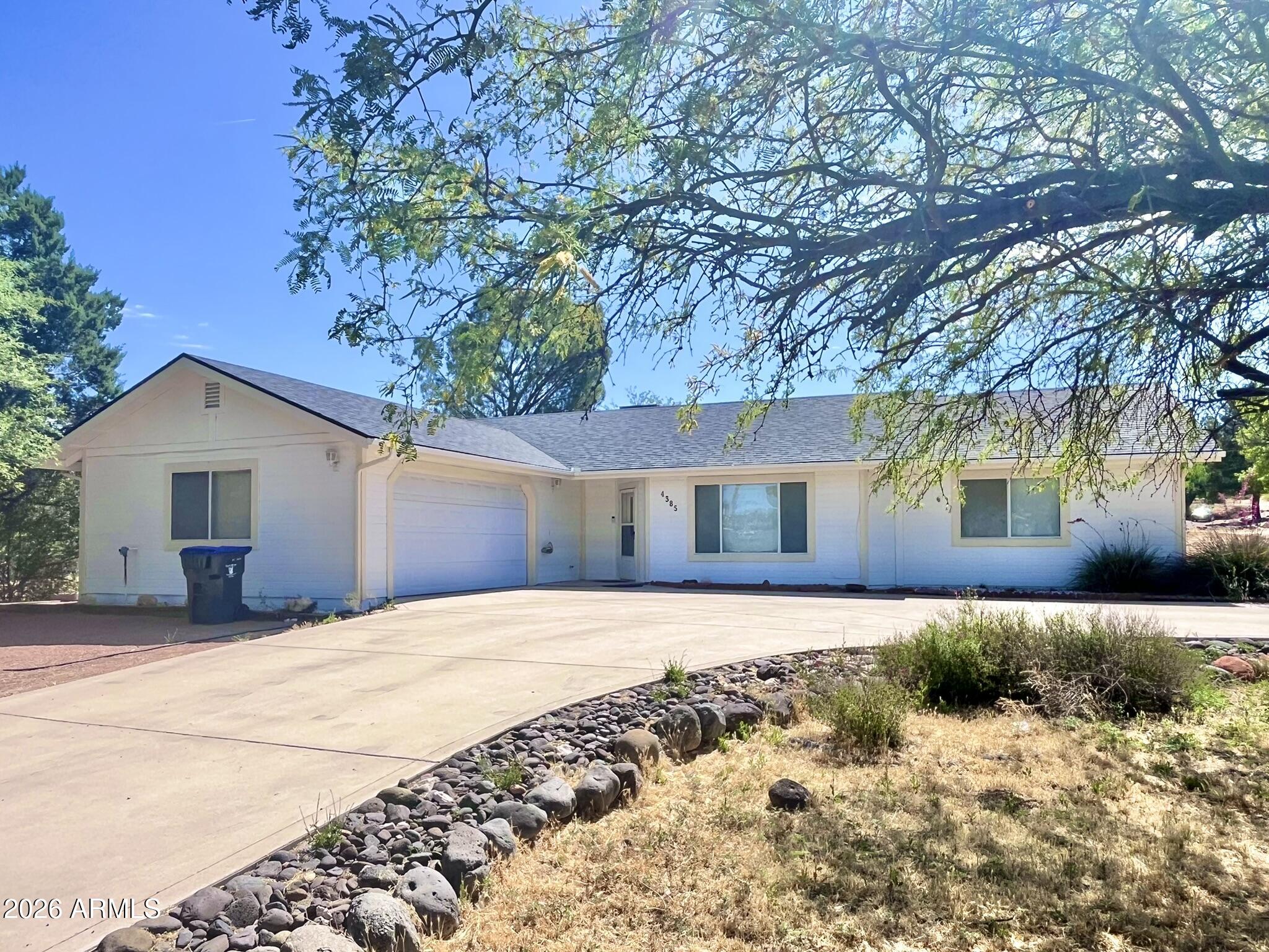 This lovely 3 bedroom home sits proudly on a corner lot, guarded by the grassy slopes of the old golf course. BRAND NEW ROOF! Exterior paint 2026. Heat pump 2024. Owner/tenants have taken extra care with all upkeep and cleaning. The third bedroom could also be set-up as office or studio with lovely, tranquil window view. Plenty of parking. I love the batwing doors in the primary bedroom, and walk-in closet! Lake Montezuma is an idyllic, quiet neighborhood scattered with mature trees, and close to Sycamore Park and the creek. This property can be called home, or can continue to make a wonderful rental property. Come see...