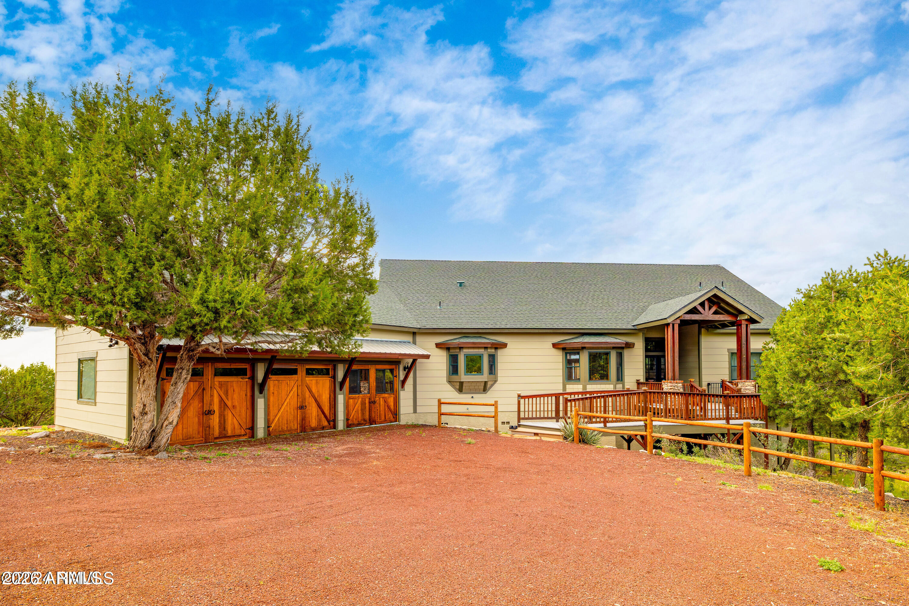 Welcome to 2667 E Overlook Dr in Williams, Arizona--your gateway to luxury and adventure. This stunning property, located in the exclusive gated community of Cedar Mountain Heights, offers over 2,600 square feet of luxury country living on 6 acres of high desert chaparral. It's the perfect retreat for families looking for a vacation home or for an investor seeking a lucrative VRBO opportunity after waiting period is satisfied. Situated just 50 miles south of the Grand Canyon, 15 miles from Route 66 and Bearizona, 42 miles to Flagstaff, and 70 miles to Sedona, this property serves as an ideal base for exploring Northern Arizona's most iconic destinations. The area is famous for its exceptional stargazing--imagine the entire Milky Way visible during new moons