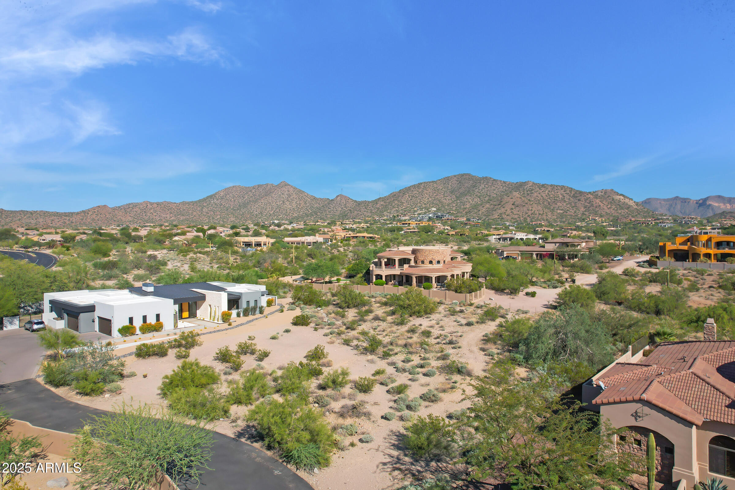 Exceptional custom homesite located within the gated enclave of Rock Canyon at Las Sendas, offering breathtaking mountain and city light views. This premium lot sits on a private street with no drive-through traffic, providing a rare combination of privacy, exclusivity, and dramatic desert surroundings.

Rock Canyon is an intimate, custom-only community of just ten homesites, designed for those seeking architectural freedom and a truly bespoke residence. Bring your builder of choice and create a one-of-a-kind luxury home tailored to your vision.

Residents enjoy access to the award-winning Robert Trent Jones Jr. golf course, along with the extensive Las Sendas amenities including parks, baseball diamonds, tennis and volleyball courts, resort-style pools, and miles of scenic hiking. Located in one of Mesa's most prestigious hillside communities, this property presents a rare opportunity to build and own in Rock Canyon at Las Sendas, where custom design, natural beauty, and an elevated lifestyle come together.