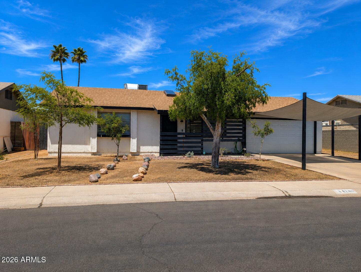 Move-in-ready North Phoenix gem with no HOA! This inviting 2-bedroom, 1-bath home features a bright, open living area enhanced by a beautiful skylight that fills the home with natural light. The updated kitchen offers granite countertops and modern cabinetry, creating a stylish and functional space for everyday living. Attractive, low-maintenance front landscaping provides great curb appeal, while the spacious backyard offers endless possibilities for entertaining, gardening, pets, or relaxing outdoors. A 2-car garage adds convenience and extra storage. Ideally located just minutes from Loop 101, I-17, shopping, dining, parks, and more, this home is an excellent opportunity for first-time buyers, downsizers, or investors.