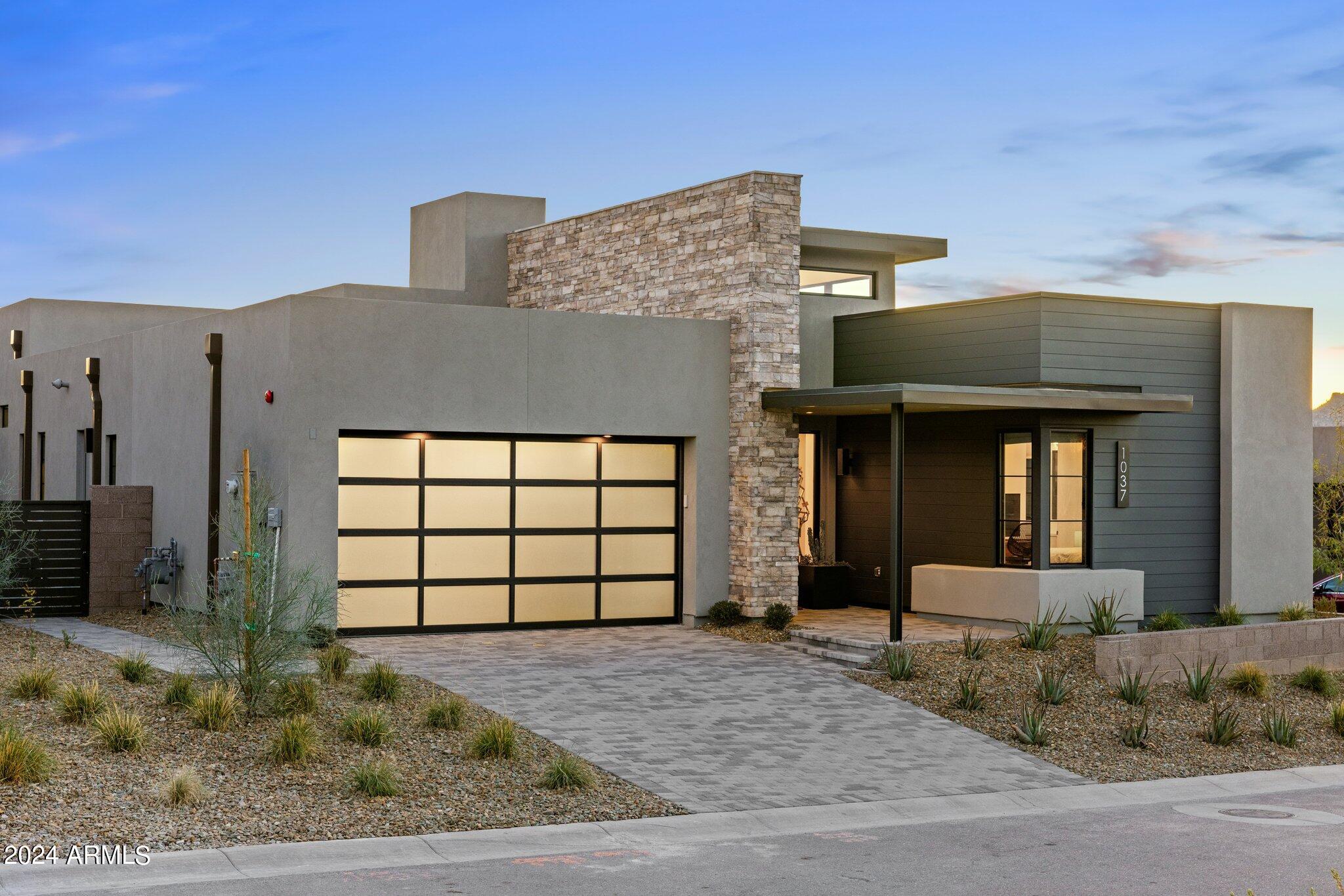 Elegantly adorned, this newer Camelot Villa plan 3, commands a vantage point over Desert Mountain's Seven Golf Course, offering picturesque views of Black Mountain along the 12th fairway. This single-level residence boasts 3 lavish ensuite bedrooms, 3.5 opulent bathrooms, a tandem 3-car garage, and features remarkable interior details including exquisite light fixtures and Bespoke draperies. The luminous and expansive great room, centered around a sophisticated modern kitchen with top-tier appliances and an expansive waterfall island, opens to the sun-drenched, south-facing backyard through 10-foot tall sliding glass pocket doors. The outdoor living space offers a pristine new pool, spa, fireplace, and a built-in BBQ. An exclusive FULL GOLF MEMBERSHIP awaits approval for the discerning buyer. Professionally selected furnishings  can be acquired through a separate bill of sale. Please reference the features list herein for an overview of all upgrades.
