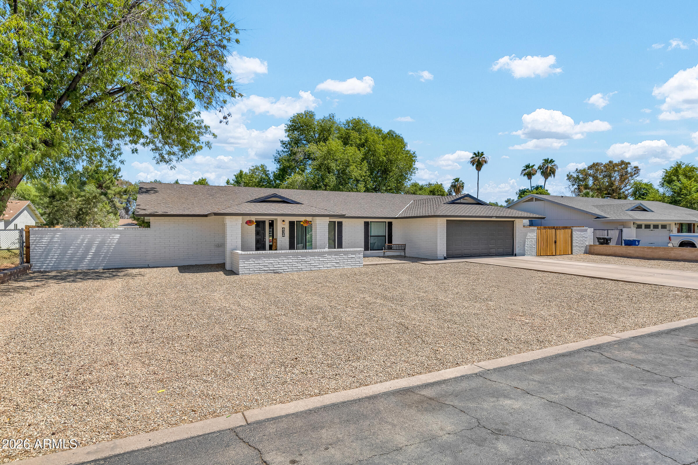Rare .63-Acre Gilbert Retreat -- Fully Renovated with Horse Privileges.

Welcome to one of the most desirable locations in all of Gilbert -- south of Guadalupe Rd and just minutes from the heart of downtown Gilbert's shops, dining, and entertainment. This fully renovated 4-bedroom, 2-bathroom home sits on a sprawling .63-acre irrigated lot with horse privileges, offering space and possibilities that simply don't come along often this close to downtown. Step inside to find a thoughtfully updated open-concept living, dining, and family space anchored by vaulted ceilings with rich wood beams. The new kitchen is a showstopper, featuring custom east coast cabinetry and stunning porcelain countertops that flow seamlessly into the main living area, making it perfect for entertaining or everyday family life. The primary suite offers a true resort-style bathroom retreat, a private escape at the end of the day.
No detail was overlooked in this renovation: new flooring throughout, fresh interior and exterior paint, all-new fixtures, doors, and windows. The home truly shows like new.
Outside, the backyard has been completely transformed with a brand-new pool and deck, ideal for beating the Arizona heat. The expansive lot also features an RV gate and ample room to build a casita, garage/workshop, or additional stables. Bring your horses, your toys, or your vision. Few properties in Gilbert offer this combination of land, location, and turnkey renovation.
This is a rare opportunity to own a piece of land with room to grow, just steps from downtown Gilbert.