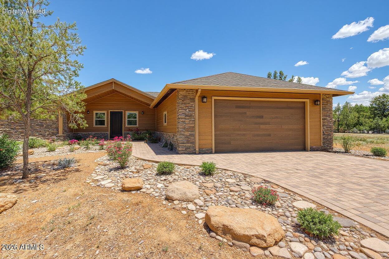 Discover refined mountain living in this beautifully crafted new construction home located in the highly sought-after gated community of Elk Springs. Thoughtfully designed with both everyday comfort and elevated style in mind, this custom retreat offers the perfect balance of luxury and livability in Arizona's White Mountains.

Inside, the expansive great room is the heart of the home, showcasing flowing luxury vinyl plank flooring, a floor-to-ceiling stacked stone gas fireplace, and vaulted tongue-and-groove ceilings that create a warm, lodge-inspired atmosphere. A wet bar adds the perfect touch for hosting guests after a day of mountain adventures. The thoughtfully designed kitchen is both beautiful and functional. The kitchen is equipped with a gas range, knotty alder cabinetry, granite countertops, and a large pantry, making it ideal for everything from quiet mornings to lively gatherings.

The home features 3 bedrooms, 2.5 bathrooms, and an extended 2-car garage with an oversized storage area--perfect for outdoor gear, hobbies, or seasonal living. A split floorplan offers privacy and balance, while the oversized primary suite serves as a true retreat, complete with a soaker tub, tiled walk-in shower, and generous space to unwind.

Step outside to enjoy the covered back patio and deck, where you can take in the cool mountain air, enjoy your morning coffee among the pines, or relax in the evening as the sun sets. Driveway pavers and quality exterior finishes further highlight the home's custom design and attention to detail.

Ideally situated near local lakes, trails, and outdoor recreation, this property offers the perfect opportunity to enjoy all four seasons in a secure, centrally located community--whether as a full-time residence or a serene mountain getaway.

This is a beautiful custom cabin with luxury touches throughout - a rare opportunity to own new construction in Elk Springs.

Note: Interior photos are staged, and landscaping images are digitally enhanced to help you envision the full potential of this property.

***

Discover the White Mountains of Arizona - where adventure, beauty, and fresh mountain air come together. Enjoy four stunning seasons, 40 lakes, and 600+ miles of rivers and streams, perfect for fishing, kayaking, and exploring.

Hit the trails on one of the largest trail systems in the Southwest, or spend winter days at Sunrise Ski Resort, just 40 minutes away with three mountains of skiing, snowboarding, and sledding.

Love shopping or culture; wander through antique shops, summer arts & craft fairs, and lively music festivals. Golfers can tee off at seven scenic courses, including three public gems.

It's no wonder Pinetop-Lakeside was voted the "Best Cabin Region in the U.S."

The White Mountains - Arizona's best-kept secret. Come explore and embrace the MAGIC!