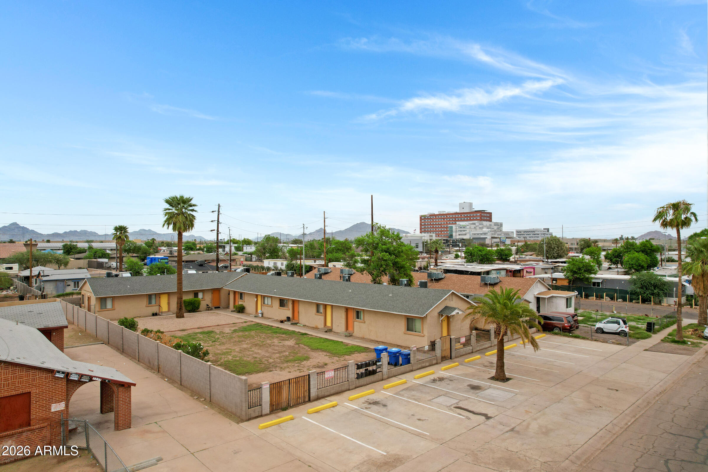 East Taylor is a 10-unit, garden-style multifamily community located in the urban core of Phoenix. Built in 1943, the property consists entirely of one-bedroom/one-bath units with durable tile or vinyl flooring and has benefited from ongoing capital improvements. The asset offers clear value-add potential through interior modernization, addition of private yard spaces, and covered parking to support rent growth. Amenities include gated access, on-site laundry, and off-street parking. Positioned near Phoenix Sky Harbor International Airport, Valley Metro Rail, and Valleywise Health Medical Center, the property benefits from strong workforce housing demand. Located within a designated Opportunity Zone, it presents both income growth and long-term tax advantages.