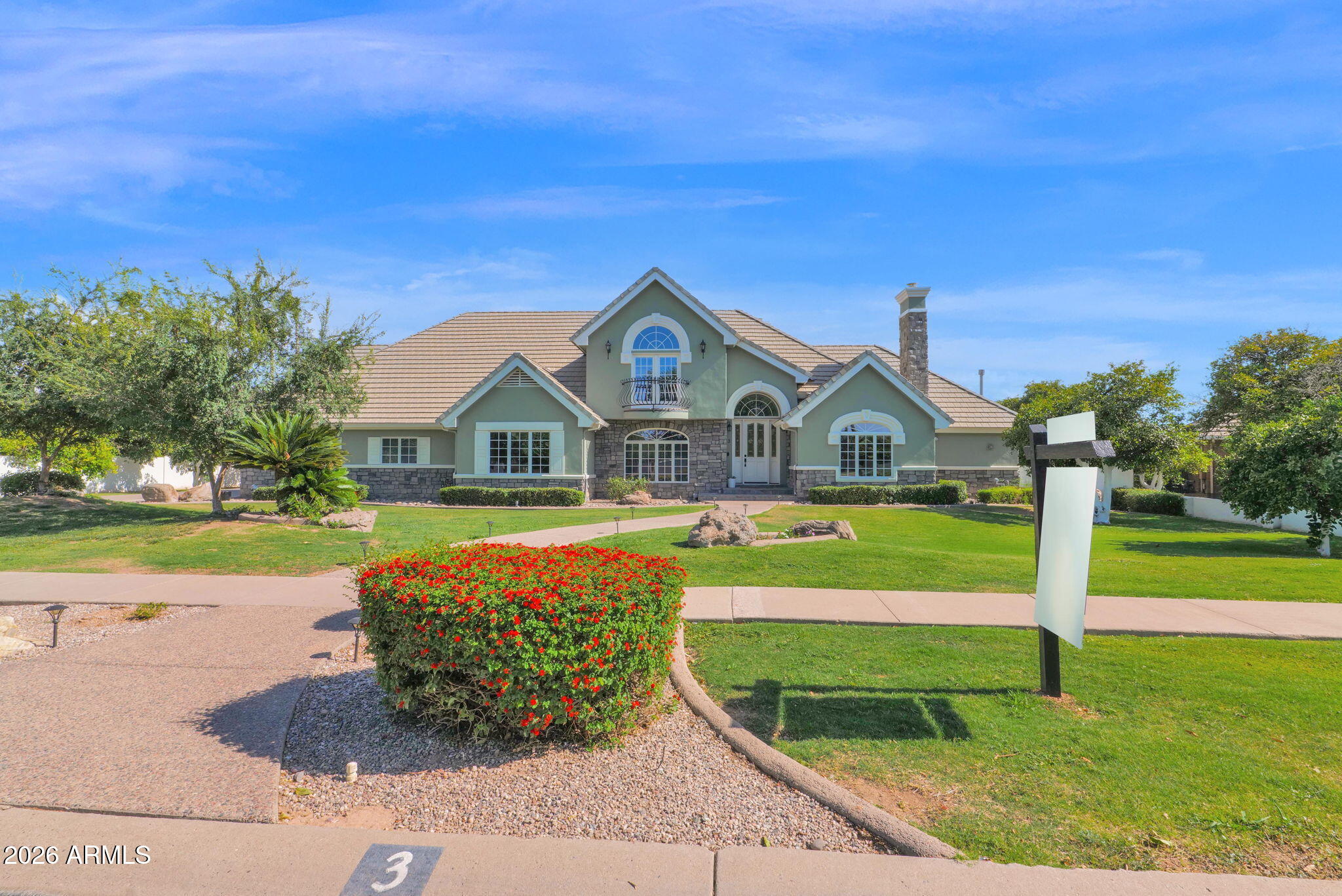 Welcome home! As you pull up, you're greeted by stunning curb appeal in this private gated neighborhood on nearly an acre of green grass with orange trees and flood irrigation. Step inside to freshly painted interiors, new hardwood floors, vaulted ceilings with exquisite trim and architectural detail.
Off from the entrance is the formal living room, large office with custom built-ins & fireplace and spacious family room. Continue to the heart of the home: the recently refreshed kitchen and flex room perfect for entertaining.
Down the hall awaits your primary suite on the main floor--complete with a spacious bath and walk-in closet. Upstairs you'll find three large bedrooms, one with a fantastic balcony.
Outside, enjoy the fenced pool and hot tub, oversized 3-car garage.