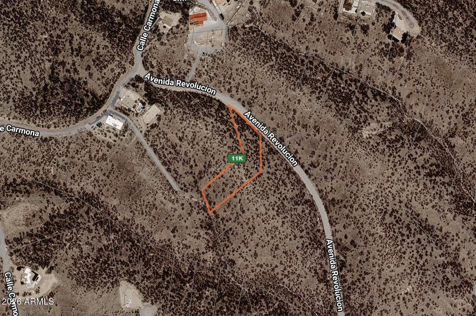 Larger lot offering strong potential for multi-family or single-family development. Spacious layout with flexibility for multiple build options. Convenient access to I-19. Ideal for investors or builders looking for value and upside. Buyer to verify zoning, utilities, access, and building requirements.