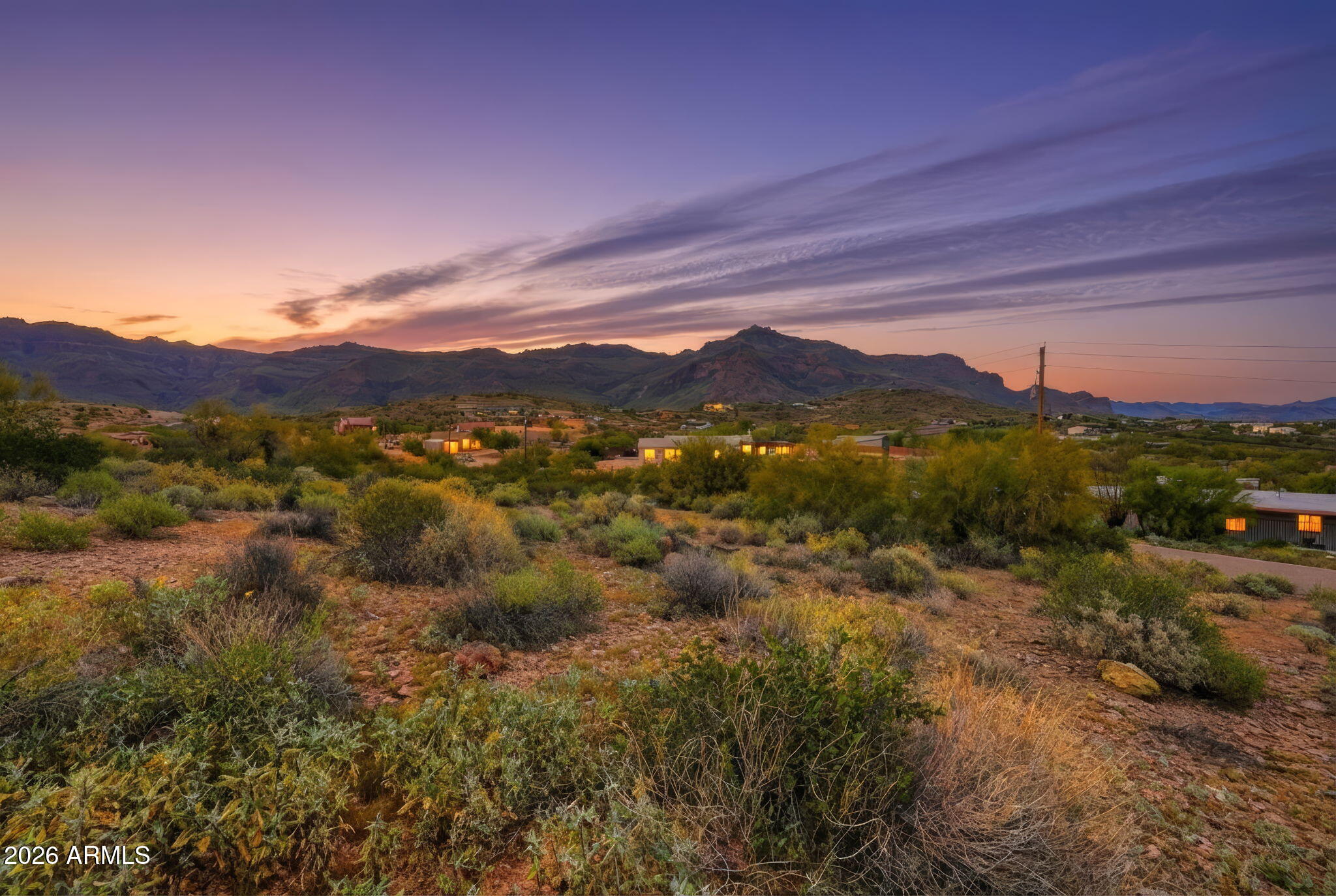 Ready to build lot. Montana Dorada, a beautiful small boutique community in Gold Canyon. Consisting of just 23 homesites, amazing views, located just minutes from The US 60, and only 30 minutes from Phoenix Sky Harbor Airport. This custom homesite has water, sewer, and electric hookups all underground on property paving the way for a custom build without the added cost of bringing in essential utilities. Montana Dorada offers PAVED hilly roads, easy access to City life, and gorgeous views in all directions. Known for its amazing Golfing, Biking, and outdoor adventure; Gold Canyon is truly one of the best kept Arizona secrets. The sweet community of Montana Dorada offers the perfect landscape to blend modern amenities with desert tranquility in the foothills of the Iconic Superstation Mnts. All renderings are artistic representations intended for conceptual visualization only.