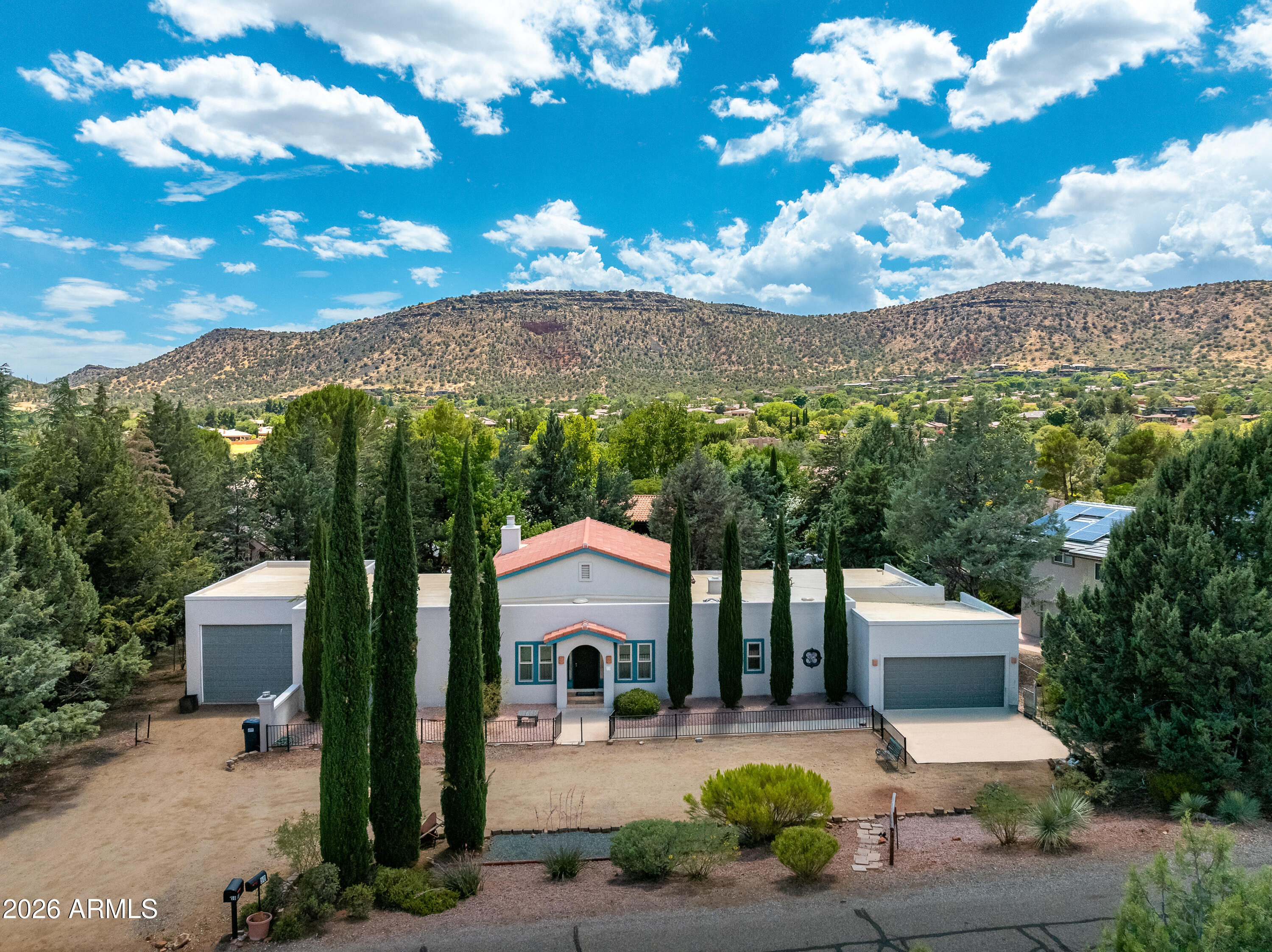 Discover a Sedona opportunity unlike any other! With no HOA and thoughtfully designed as two separate living quarters connected by a shared indoor pool, this one-of-a-kind 3 bed 3 bath 3368 sq ft property offers incredible flexibility. Perfect for multi-generational living, a private retreat, or an income-producing investment (subject to local regulations). A spacious backyard provides room to relax, entertain, or create your own outdoor oasis, while RV parking adds even more convenience. Let your imagination wander as the possibilities grow--and so could your bank account. This is more than a home...it's a lifestyle, an investment, and an opportunity waiting to be explored.
