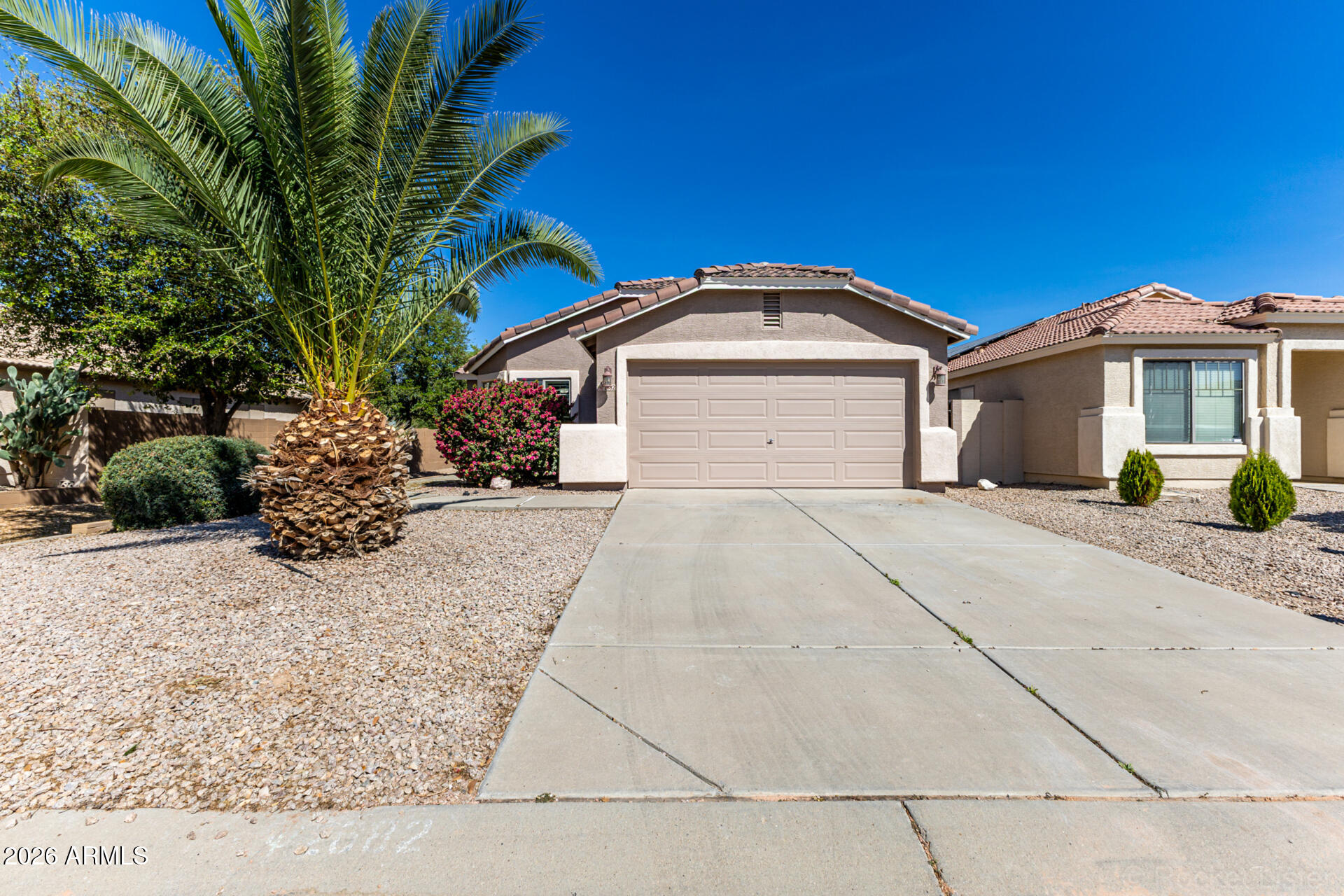 Welcome to this beautifully maintained 3-bedroom, 2-bath home with a versatile den, ideally situated in the desirable Rancho Bella Vista community. This north/south-facing property offers energy efficiency with solar panels and stylish updates throughout. 
Step inside to find a bright, open layout featuring newly painted interiors, tile flooring throughout, and elegant plantation shutters. The kitchen showcases freshly painted white cabinetry, new appliances and durable Corian countertops, perfect for both everyday living and entertaining.
The flexible den provides the ideal space for a home , playroom, or additional living area. The spacious 2-car garage adds convenience and storage. 
Out back, enjoy a low-maintenance yard with artificial turf and clean landscaping--perfect for relaxin the upkeep.

This move-in-ready home combines comfort, efficiency, and style in a prime location-don't miss this opportunity!