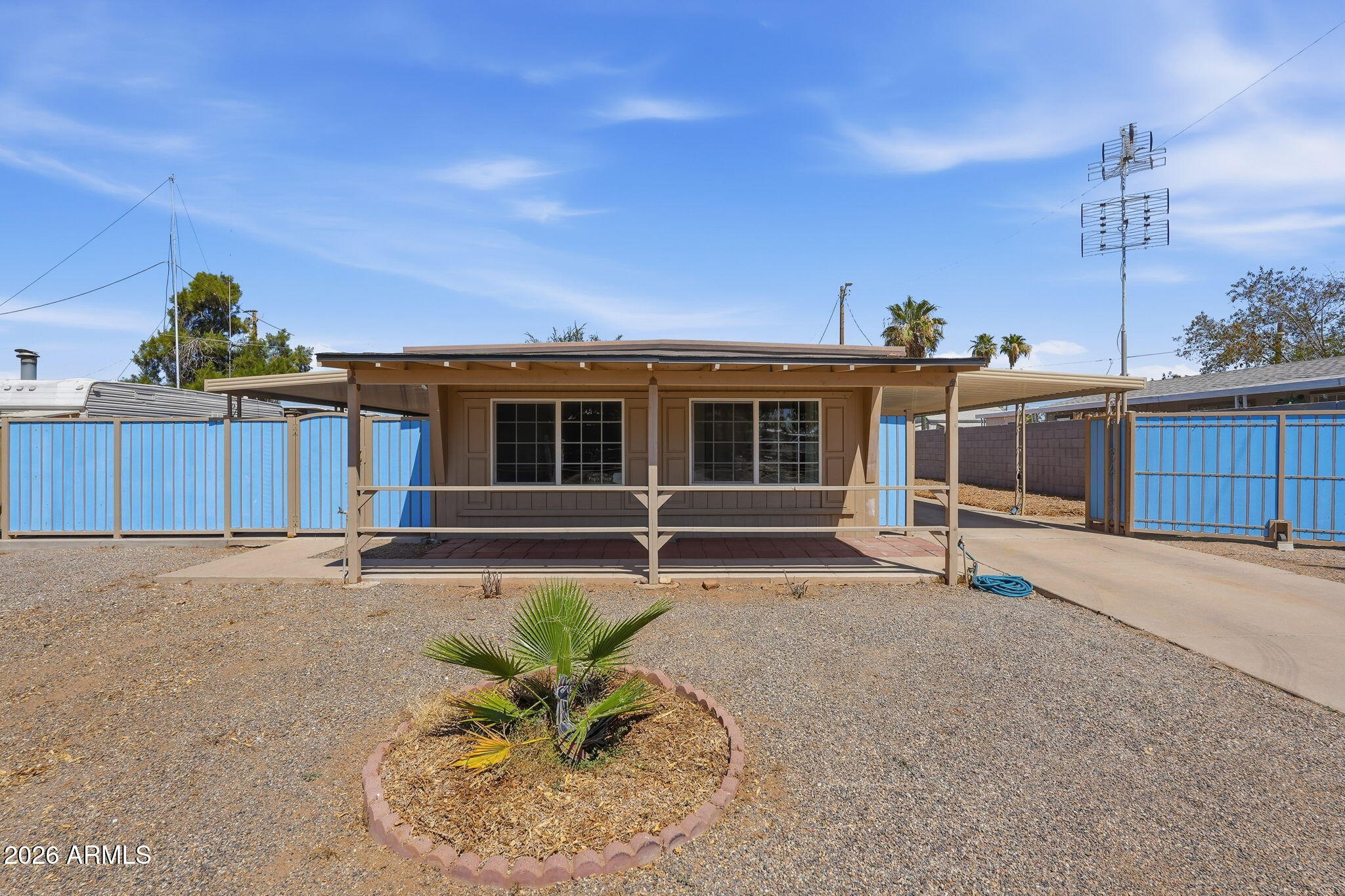 This little gem has been completely remodeled and upgrades galore, down to the studs (added stud 2x4s) about 10 years ago. The floor plan completely redone for a larger bedroom and comfortable practicality including upgraded insulation, tankless water heater and footed tub. The kitchen has upgraded cabinets, a pantry, and all stainless steel appliances, with refrigerator, front loading washer and dryer, included! 2026 new carpet and paint, and the built in living room shelving, stereo and the TV in the bedroom stay with the home. Lovingly cared for and maintained, with an air conditioned and finished work shed out back in the low maintenance yard. Make sure to check out the community pool and clubhouse, this HOA is truly run by the residents for the good of the neighborhood