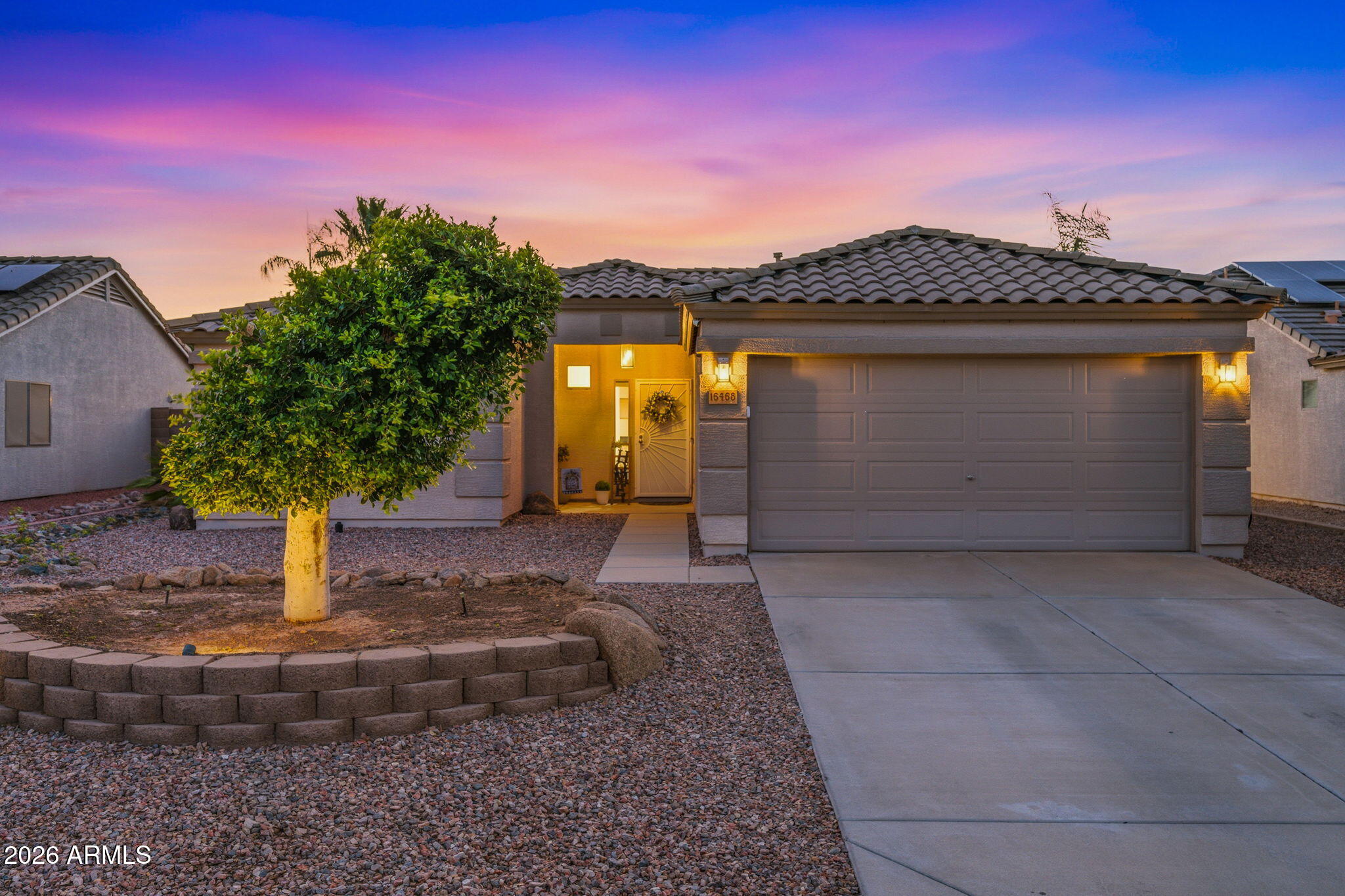 Welcome home to this beautifully maintained single-story 3 bed / 2 bath home featuring a desirable split floor plan & soaring vaulted ceilings. New HVAC (2024), Water Heater (2022), & many more upgrades! The spacious kitchen is the heart of the home, complete with a large island, ample cabinetry & stainless steel appliances. The primary suite offers a spa-inspired ensuite bathroom w/ dual vanities, a separate soaking tub & shower and walk-in closet. Designed for entertaining, the home is wired throughout & ready for game days, movie nights, & gatherings! Step outside to a beautifully landscaped backyard featuring an above-ground pool, outdoor kitchen with grill & sink, outdoor seating, fire pit, and plenty of space to relax & enjoy Arizona living. Refrigerator, Washer & Dryer included!