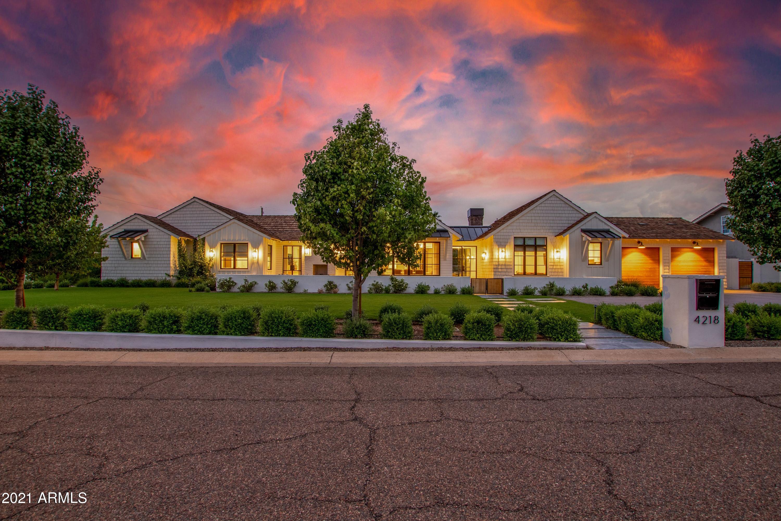 Newport chic Arcadia Proper stunning coastal new build. No expense was spared in this split floorplan high boned build. Quartz and soapstone counters, wide plank rift white oak floors and beams, brass hardware, butlers walk in and second pantry. Resort style backyard complete with modern salt heated pool and spa, three outdoor fireplaces/pits, soaring Camelback views and grilling outdoor bar. Inside features multiple entertaining spaces with double living room and full detached guest house. Beach bike to Waterfront Old Town, Fashion Square or all the best shops and restaurants Arcadia has to offer. Minutes from the cities best golf and between the Royal Palms and Phoenician resort north of Lafayette in Hopi district, 10 on location.  MULTIPLE offers anticipated- race over!