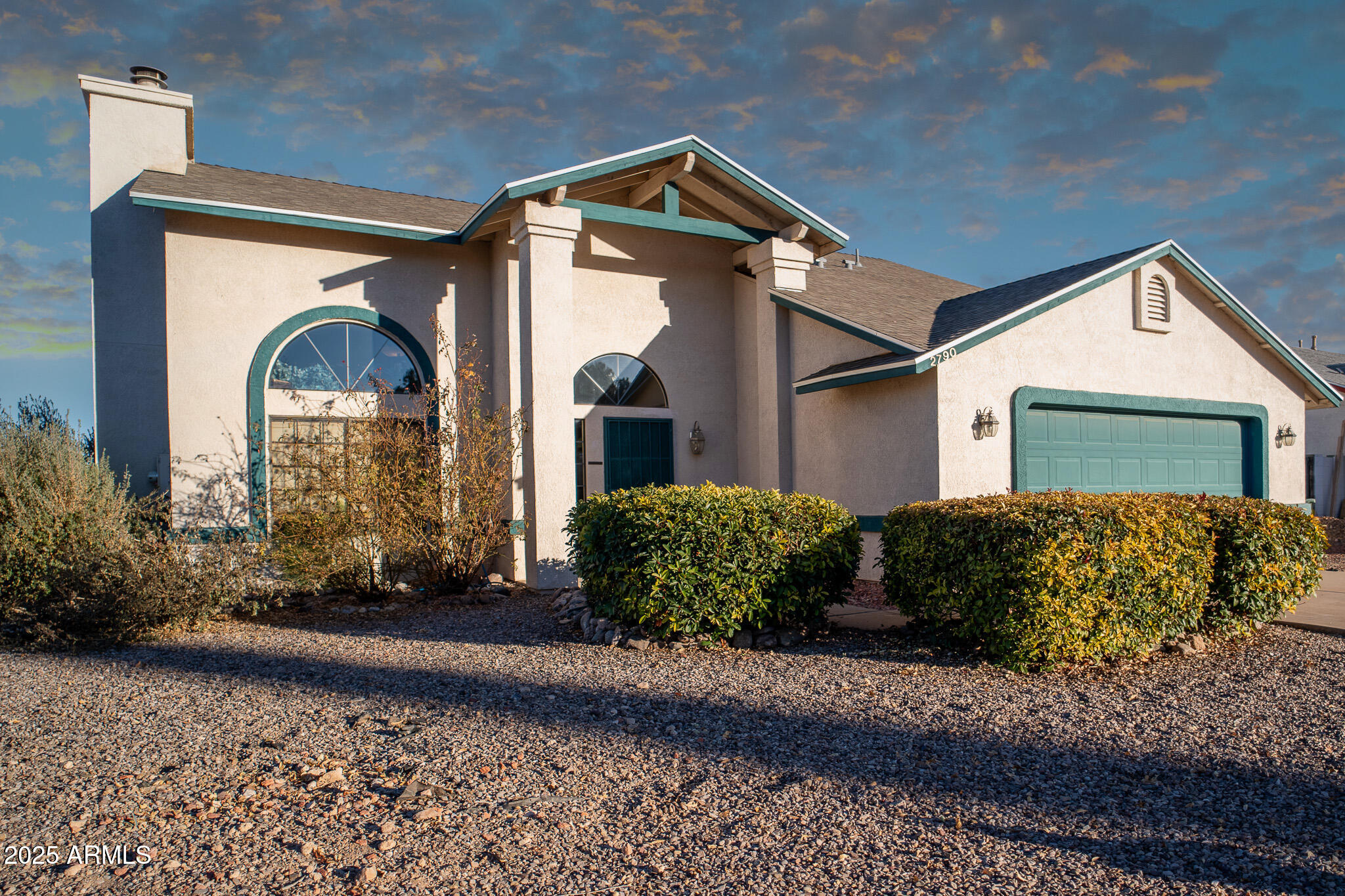 Beautiful 4 bed, 2.5 bath, 2 story home nestled in the desirable Shadow Ridge subdivision. This corner lot home offers so much potential! Primary bedroom is downstairs and offers a walk in closet, dual sinks in bathroom and a private backyard access. Additional half bath downstairs is perfect when entertaining.  Two Story ceilings in living room with beautiful windows offer an abundance of natural light. You will love living in this cozy neighborhood that is close to schools, shopping and only minutes for Fort Huachuca.
