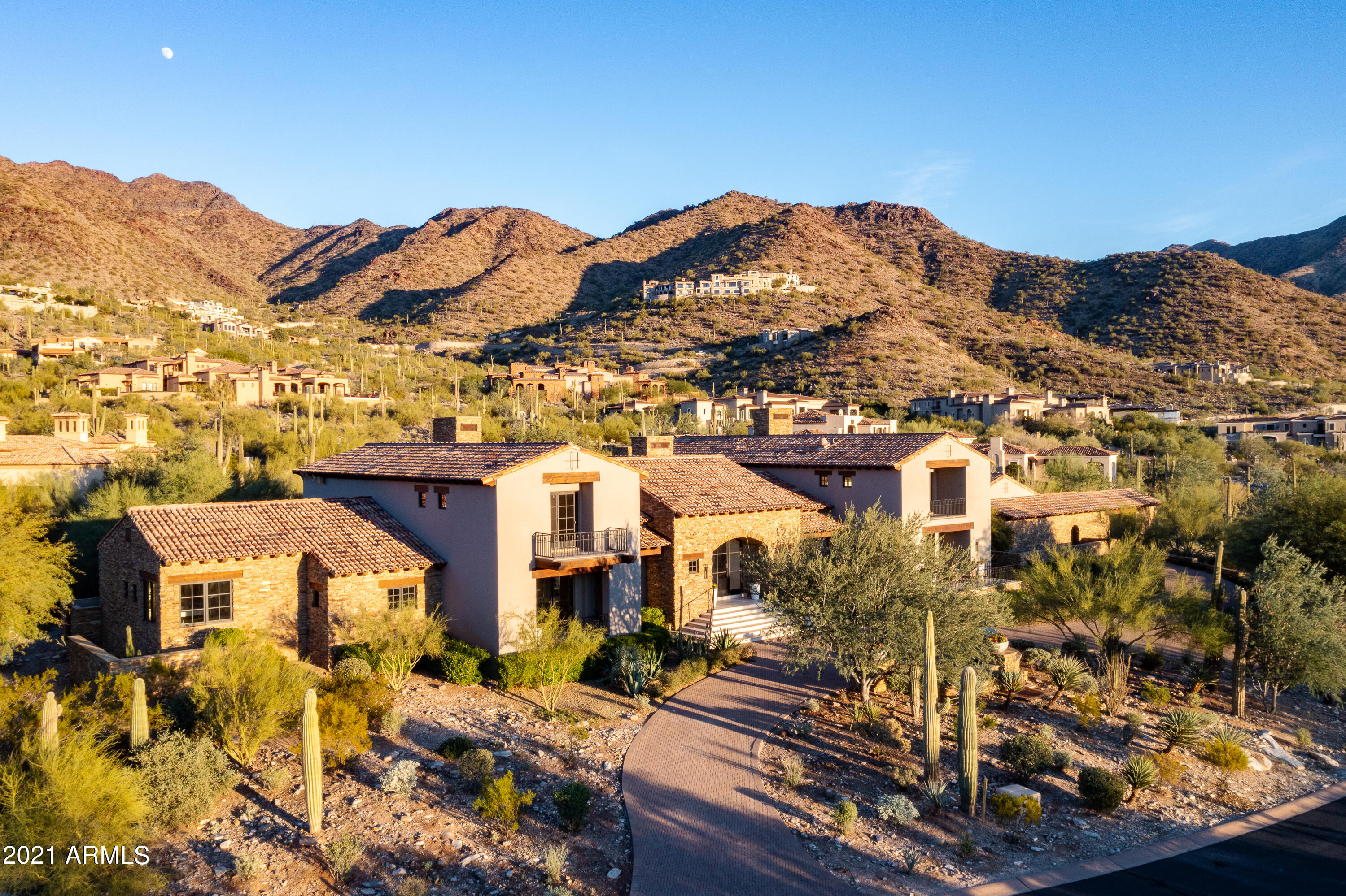 *NEW FULL REMODEL* When walking into this modern yet inviting home for the first time, with framed East to West city light and mountain views, it is evident that this home is one-of-a-kind. The 1.4 acre estate is situated up in the distinguished Upper Canyon of Silverleaf. The 9,000 sqft home accommodates 5 bedrooms with 7 baths, including a separate guest casita. Materials include elegant white limestone, Taj Mahal Quartzite countertops, Distinctive Custom Cabinetry, and natural white oak hardwood floors throughout. Key features include an enclosed dual glass wine room, automatic sliding glass doors, a climate controlled 3-car garage, full bbq entertaining area with built in pizza oven, two spas, and a posh spa-like master bath. See for yourself the grand qualities this home has to offer.