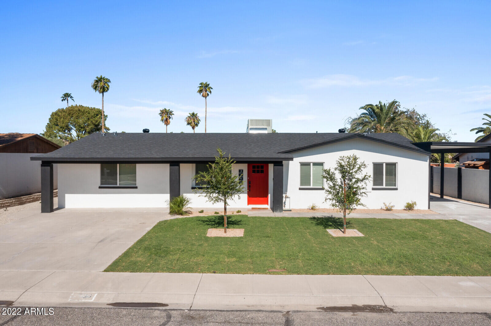BEAUTIFULLY remodeled in 2022, NO HOA! Just installed brand new luxury vinyl plank flooring! This exceptional home offers the perfect blend of modern style, quality upgrades & an unbeatable central location just minutes from the PV Reimagined development, Hwy 51, premier dining, shopping & mountain preserve trails. Nearly every aspect of the home was updated in 2022 including roof, A/C, plumbing, electrical, windows,  kitchen, baths & pool upgrades. The gorgeous kitchen features quartz countertops, breakfast bar seating, abundant cabinetry & open shelving. Spacious primary suite offers a large walk-in closet, dual sinks & an oversized designer shower. Step outside to your private Arizona oasis with a sparkling diving pool, expansive covered patio, lush landscaping & room to entertain