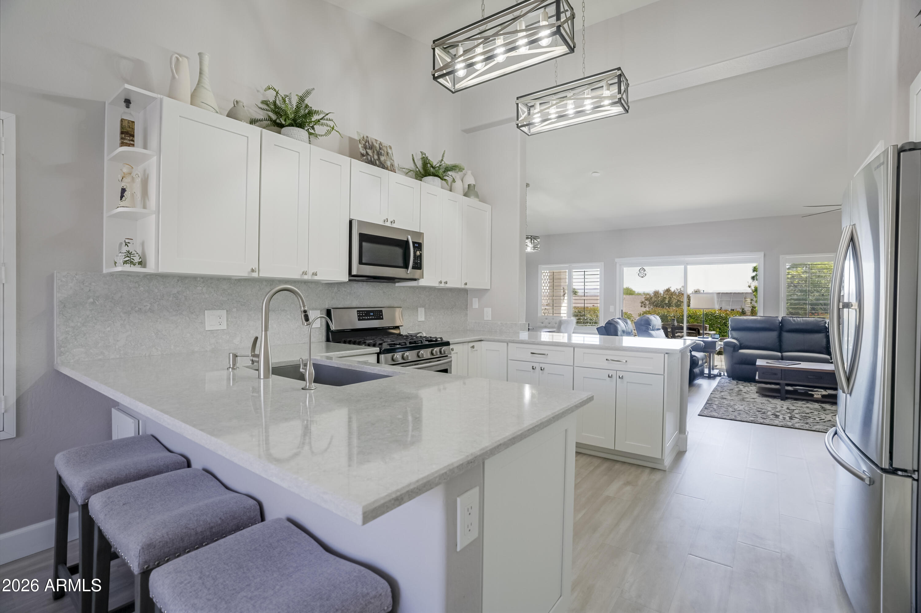 Turnkey, beautifully renovated, and located in a sought-after Del Webb community--this 3-bedroom, 2-bath home is the total package! Thoughtfully updated throughout, it features a stunning new kitchen with upgraded cabinetry and countertops, along with stylish new flooring and fresh interior and exterior paint. The bathrooms have been tastefully remodeled, and a new AC system (2023) ensures year-round comfort. Enjoy energy savings with fully paid-off solar, plus newly refreshed landscaping for great curb appeal. Nestled in a vibrant, amenity-rich community, this move-in ready home offers the perfect blend of modern upgrades, efficiency, and lifestyle!