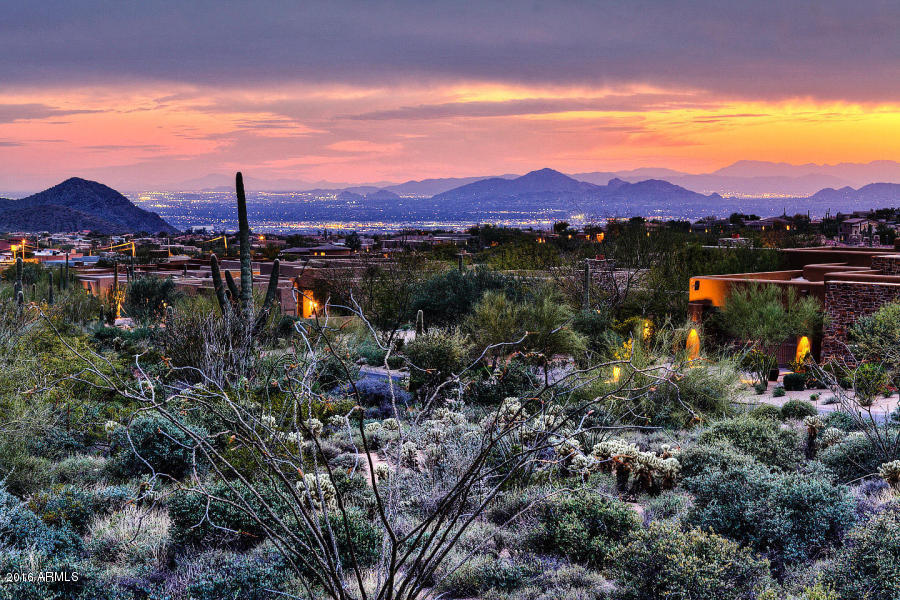 Brand new custom home at the Four Seasons Resort. 4 bedrooms, 4 1/2 bathrooms, 5,007 square feet, accompanied by completely unobstructed views of Troon Mountain, the McDowell Mountains, Pinnacle Peak and the city lights of Scottsdale. Ownership includes a membership to the Pinnacle Club, giving you access to virtually all the amenities of the Four Seasons Resort - one minute walk away and making you a ‘permanent guest’ of Scottsdale's finest resort.