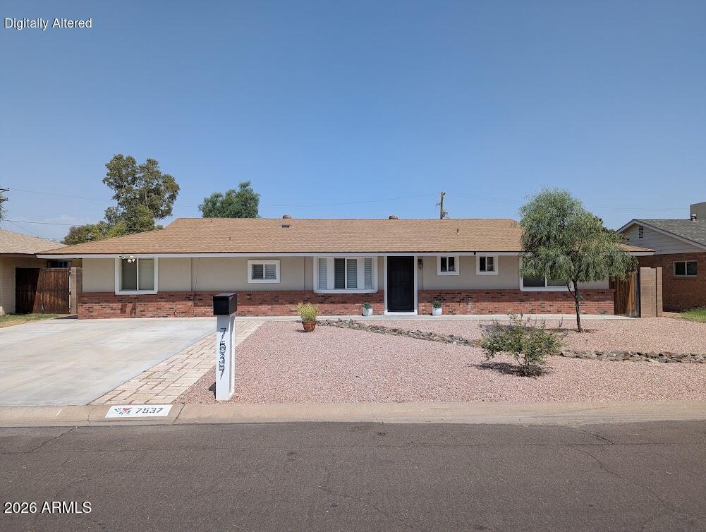 Welcome Home, this charming 4-bedroom home in highly desirable North Central Phoenix checks every single box on your wishlist. From a seamless open-concept design to a beautifully updated kitchen with a spacious island, and a split 4th-bedroom layout that offers ideal privacy for guests or a home office. The backyard features a large covered patio perfect for entertaining friends and family. Situated on an expansive lot with an existing RV gate, there is plenty of room to expand the home or take full advantage of the rare, detached garage and workshop space. Best of all, you are just a few steps from a Great highly rated school. Additionally shopping, freeway access, and the light rail are all nearby. Hurry and see this gem before it is too late!