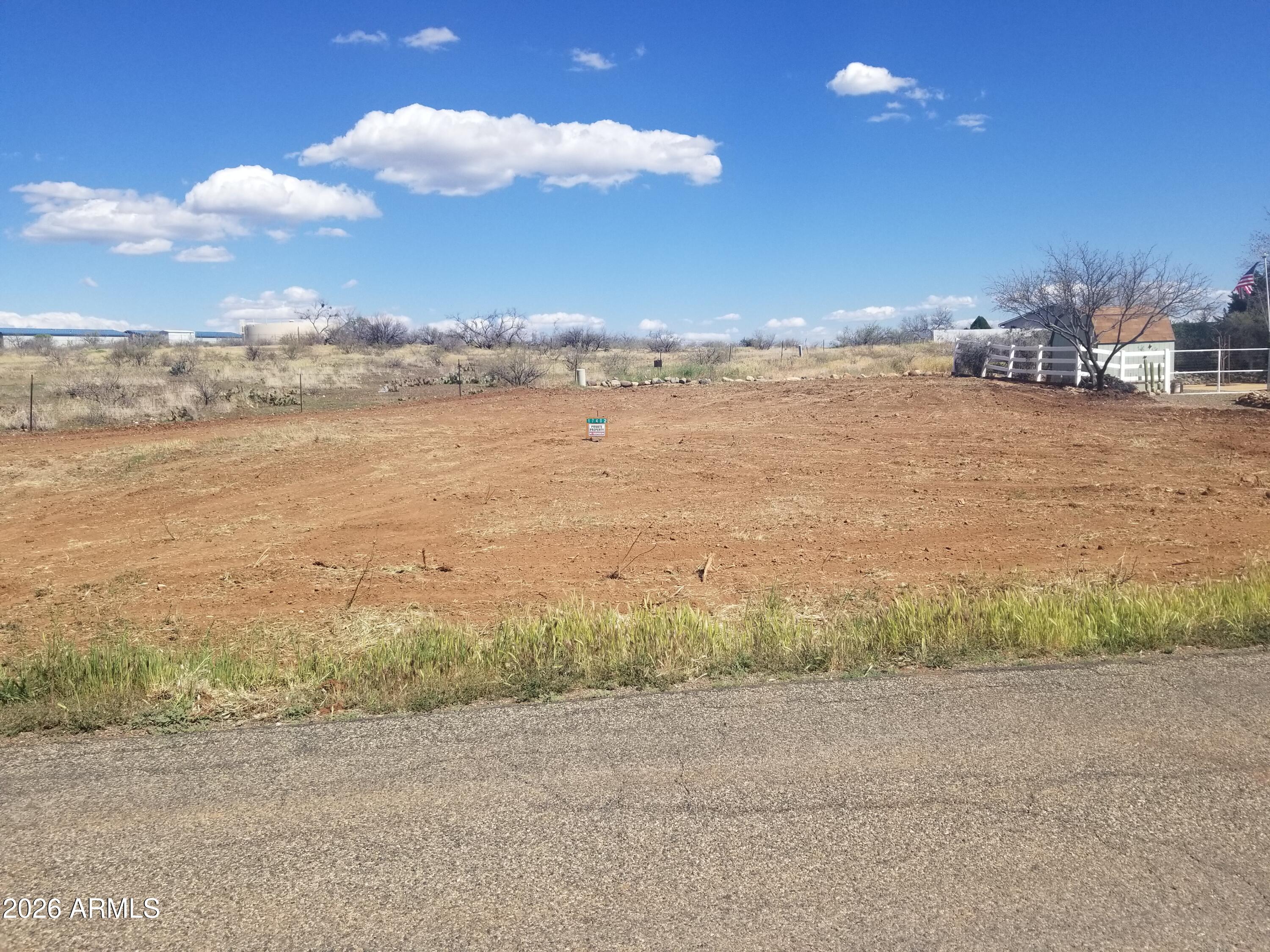 PERFECT FOR YOUR MANUFACTURED OR SITE-BUILT HOME AND NO HOA FEES! This may be the most desirable residential lot currently available in Spring Valley. It has not been on the market since 1987. This 0.24-acre lot borders a school and open space. Just one hour to Phoenix and 30 minutes to Prescott Valley, with easy freeway access. Enjoy a rural atmosphere while still having all essential amenities. Needs septic system. UTILITIES ARE AVAILABLE. Don't miss this great opportunity!