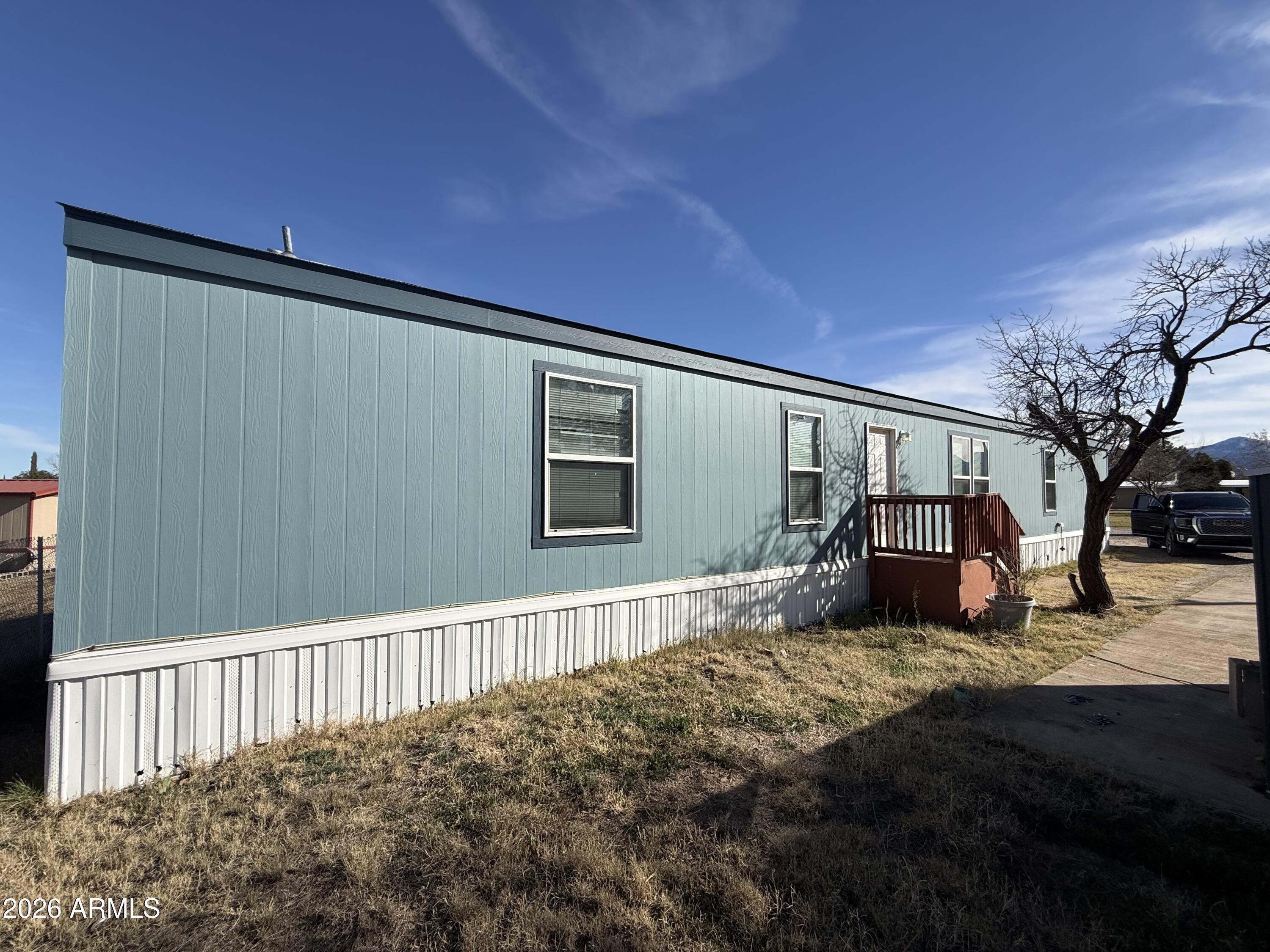 2017 built home in the Central Park Estates community with split floorpan, central heat and air. This property has been upgraded by its owner and looks amazing. Walking distance to shopping and restaurants, quiet community with views of the mountains. Space rental feee includes trash, water, sewer and road maintenance. Plenty of parking or space for relaxing. Concrete pad for a patio or shed.