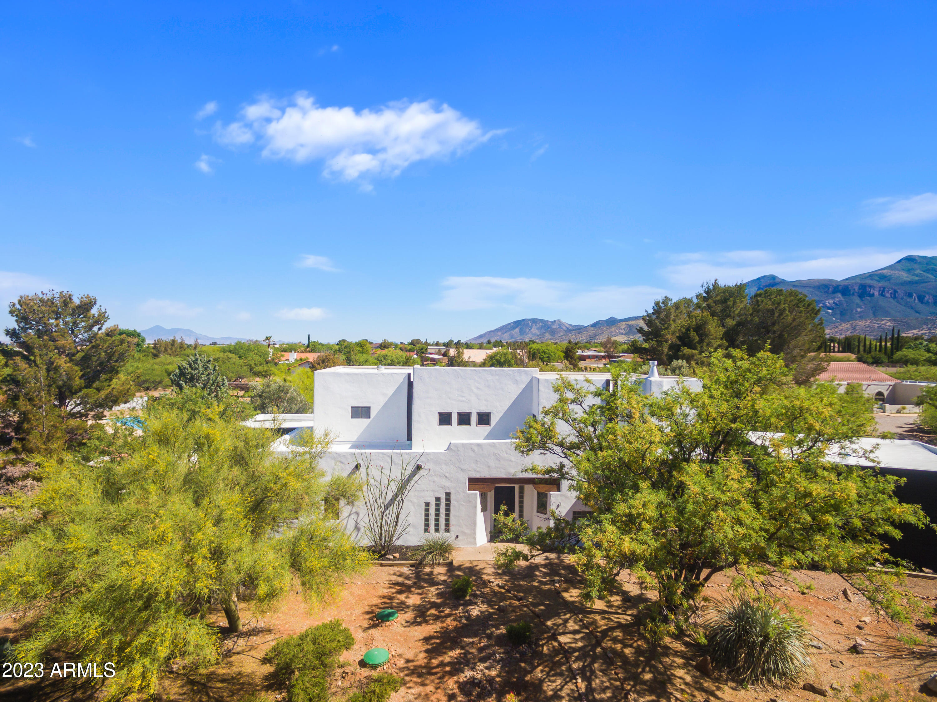Welcome to this stunning remodeled home nestled on an acre of land. This gorgeous property boasts 3 spacious bedrooms & 3.5 modern bathrooms, all meticulously renovated to provide a luxurious living experience. With attention to detail evident throughout, the home offers a perfect blend of contemporary design & timeless charm. The open floor plan allows for seamless flow between the living spaces, creating an inviting atmosphere for entertaining and relaxation. The expansive windows provide abundant natural light. Step outside onto the meticulously landscaped grounds, where you'll find a serene oasis to unwind. This property offers a rare combination of modern elegance, natural beauty, & ample space for you to call HOME.