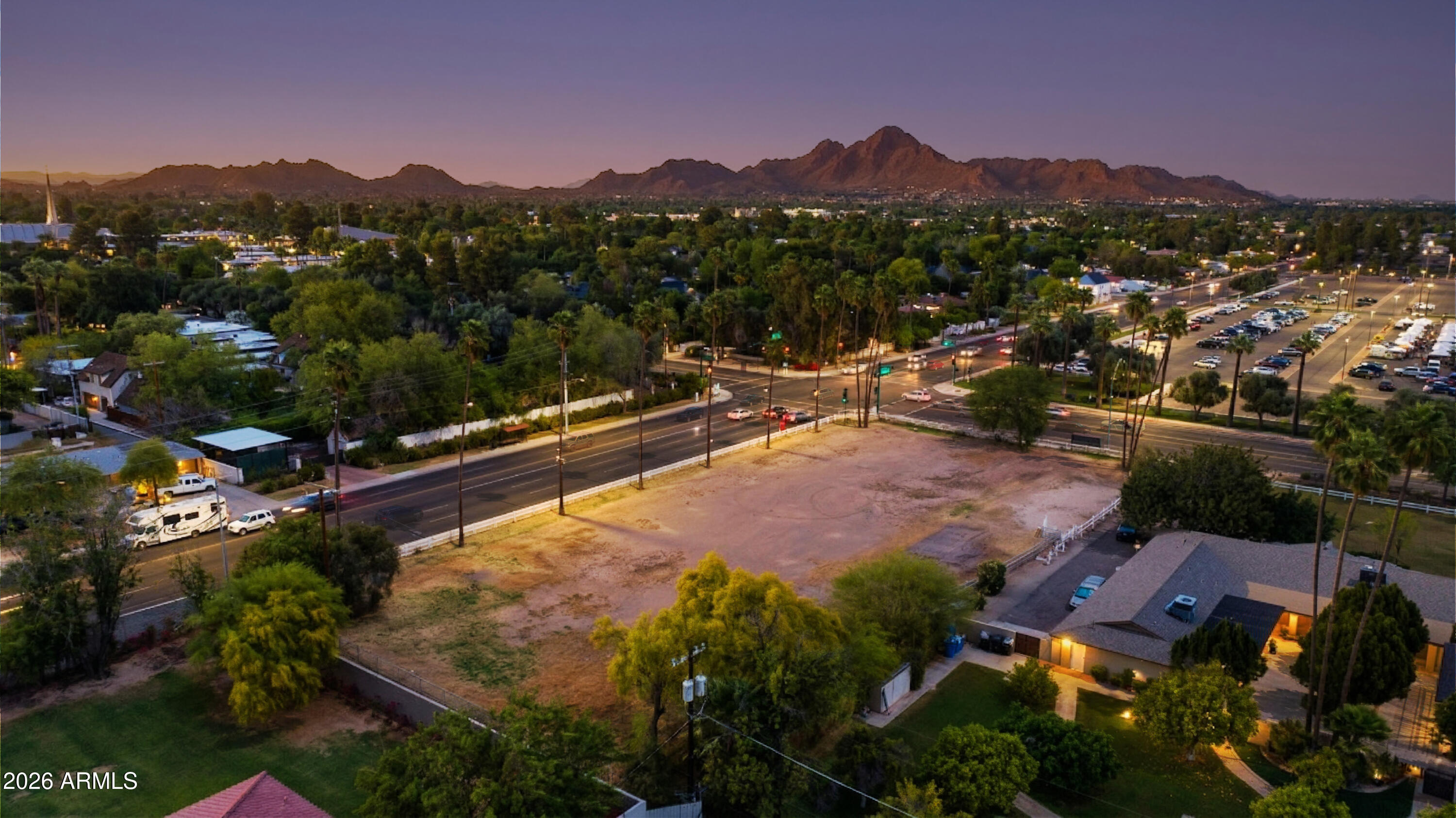 An incredible opportunity awaits to own this remarkable 1-acre parcel of land, offering the perfect canvas to bring your dream home to life! With limitless possibilities, this vacant lot is ready for your visionary design. Water is already available on-site, along with flood irrigation. This expansive lot offers unmatched potential in a prime location! Located within the Madison School District and close to top-tier private schools such as All Saints, Brophy Prep, and Xavier High School and within walking distance to Uptown's Farmers Market, Murphy's Bridle Path, and some of the area's best restaurants.