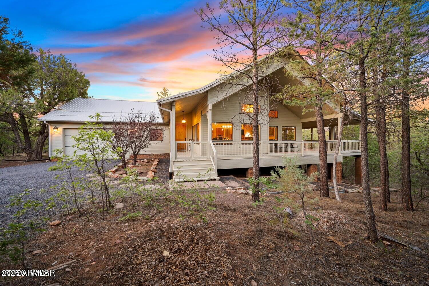 Gorgeous 4 bed, 2.5 bath home in the highly desirable Sierra Pines neighborhood! Close to all the amenities that the city of Show Low has to offer while still giving you the peace and privacy you've been looking for. This beautiful home features a newly installed A/C, new grinder pump, some new flooring, and fresh interior paint. It also comes fully furnished! The layout offers three bedrooms upstairs plus a basement with a game room -- perfect for entertaining or extra living space. Backing directly to the forest, no neighbors behind you, giving you stunning views, privacy, and quiet surroundings. Situated on .88 acres, this property feels even larger with the forest right in your backyard. Don't miss your chance to make this incredible property home!