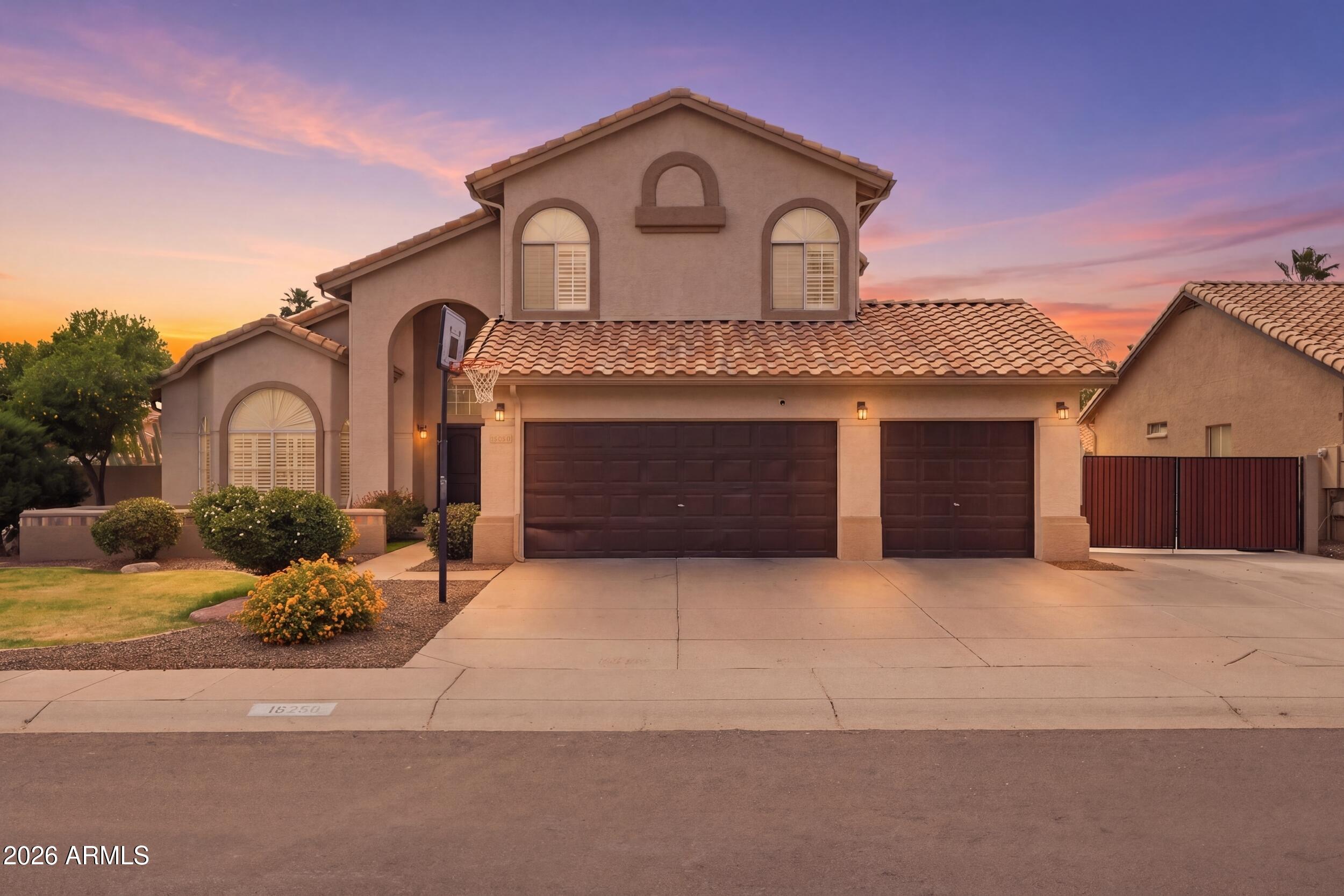 Spacious 4,211 SF home with 5 beds, 3.5 baths, 3-car garage, and RV gate in the sought-after Paradise Valley School District. Thoughtful floor plan includes a hidden basement entrance -- don't miss it! -- revealing two bedrooms, a full bath, and a media/family room. Upstairs hosts the primary suite and two additional bedrooms. The main level offers a bonus room, formal living and dining areas, and a cozy family room with fireplace. Step outside to a private backyard retreat with pool, spa, and grassy play area. Situated directly across from a community greenbelt with gated access, and just minutes from Kierland, Desert Ridge, the upcoming PV Mall redevelopment, and easy access to the 51 and 101 freeways.