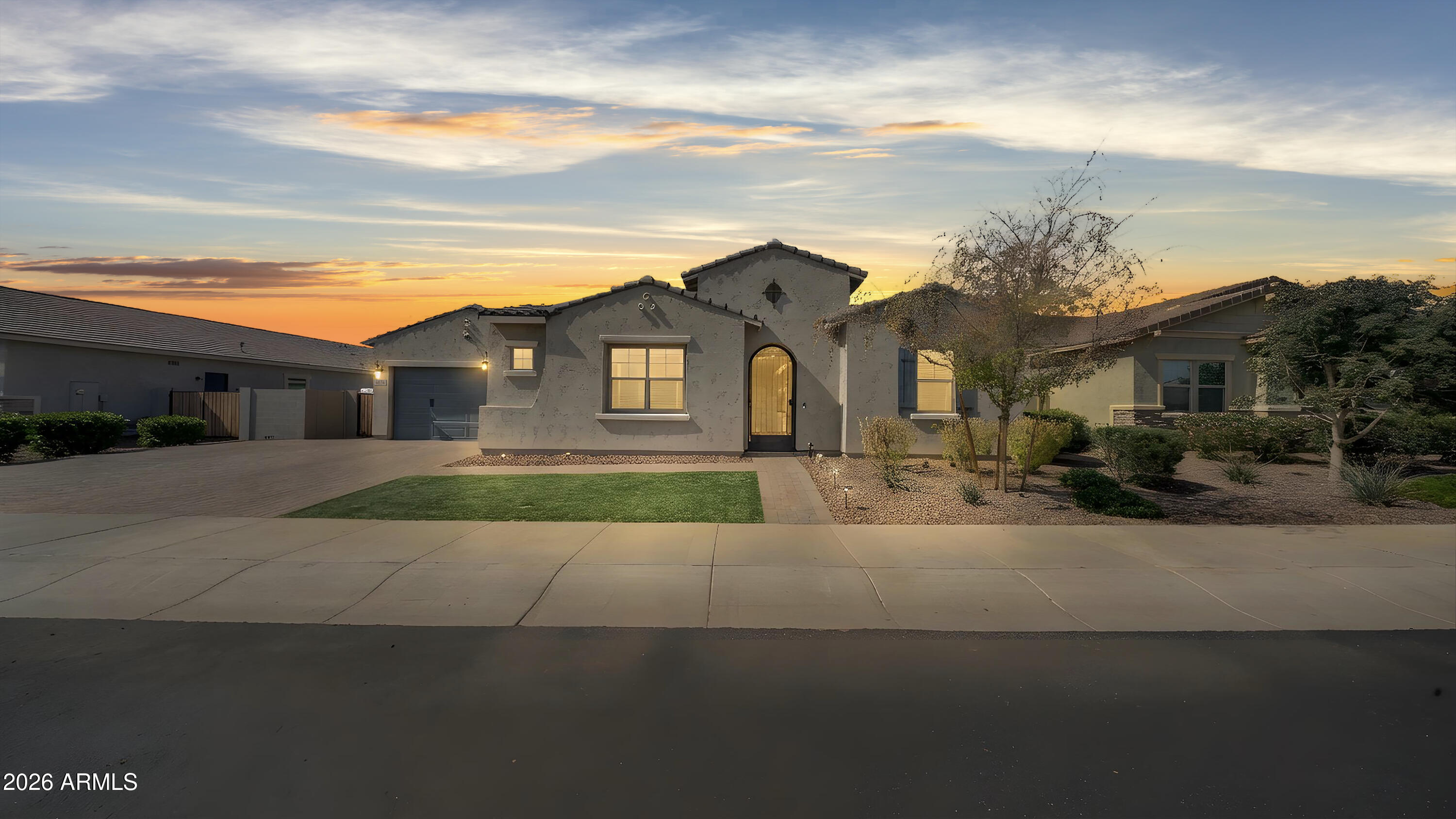 Exceptional 4-bedroom home in Sedella! Gated Community. Step inside home with a personal courtyard, with open floor plan concept great room with high ceilings! The chefs kitchen, large island, SS appliances,. Also feature a low-maintenance landscaping, ramada, basketball court, 3-car garage, RV gate, and extensive paver work. Located in a vibrant community with parks, walking trails, and convenient access to AZ-303. Don't miss this amazing opportunity!
