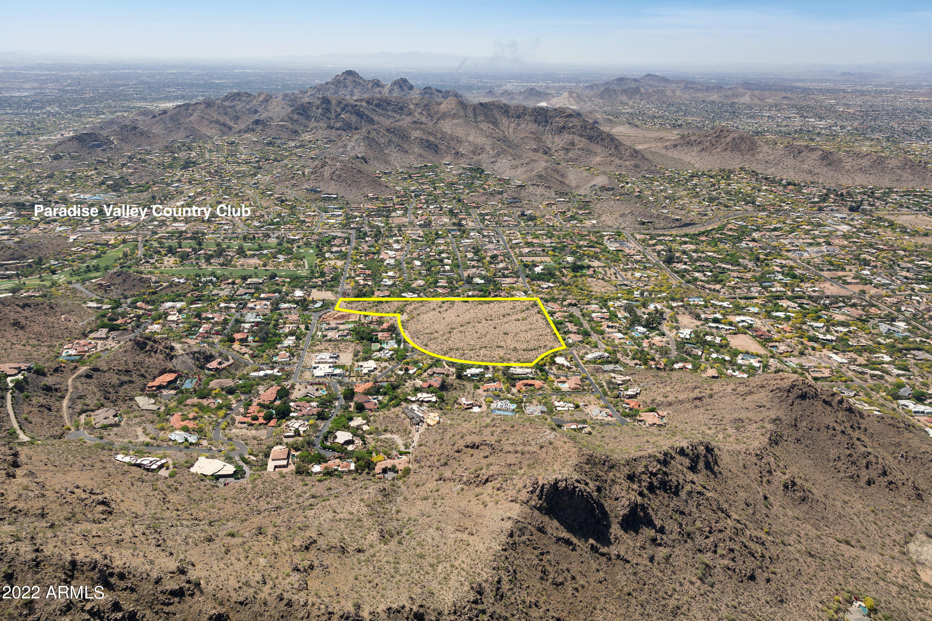 The last and largest blue chip flat (non hillside) 27 Acre parcel in one of the  most exclusive areas of Paradise Valley AZ, one of the wealthiest zip codes (85253) in the Country. With Paradise Valley homesites limited to 1 acre + larger, and nestled conveniently between Scottsdale + Phoenix, Paradise Valley attracts those in search of privacy + space, yet want to be near golf, hiking, 5 star resorts, fine dining, nightlife, major airports + great medical care. It is very near the exclusive Paradise Valley Country Club and surrounded by scenic Mountains. This property is ideal for a magnificent family compound. However, since it is zoned R-43 (one house per acre) it has the possibility of 21 homesites or a variety of larger  2,3,4,or 5 acre homesites. Conceptual site plans are available. Paradise Valley has no traffic, fabulous weather and many upscale resorts, including the almost completed Ritz Carlton Resort.
This privately held residential site, the last of its size and prestigious location has been left in its natural state and owned by the same family for many years!