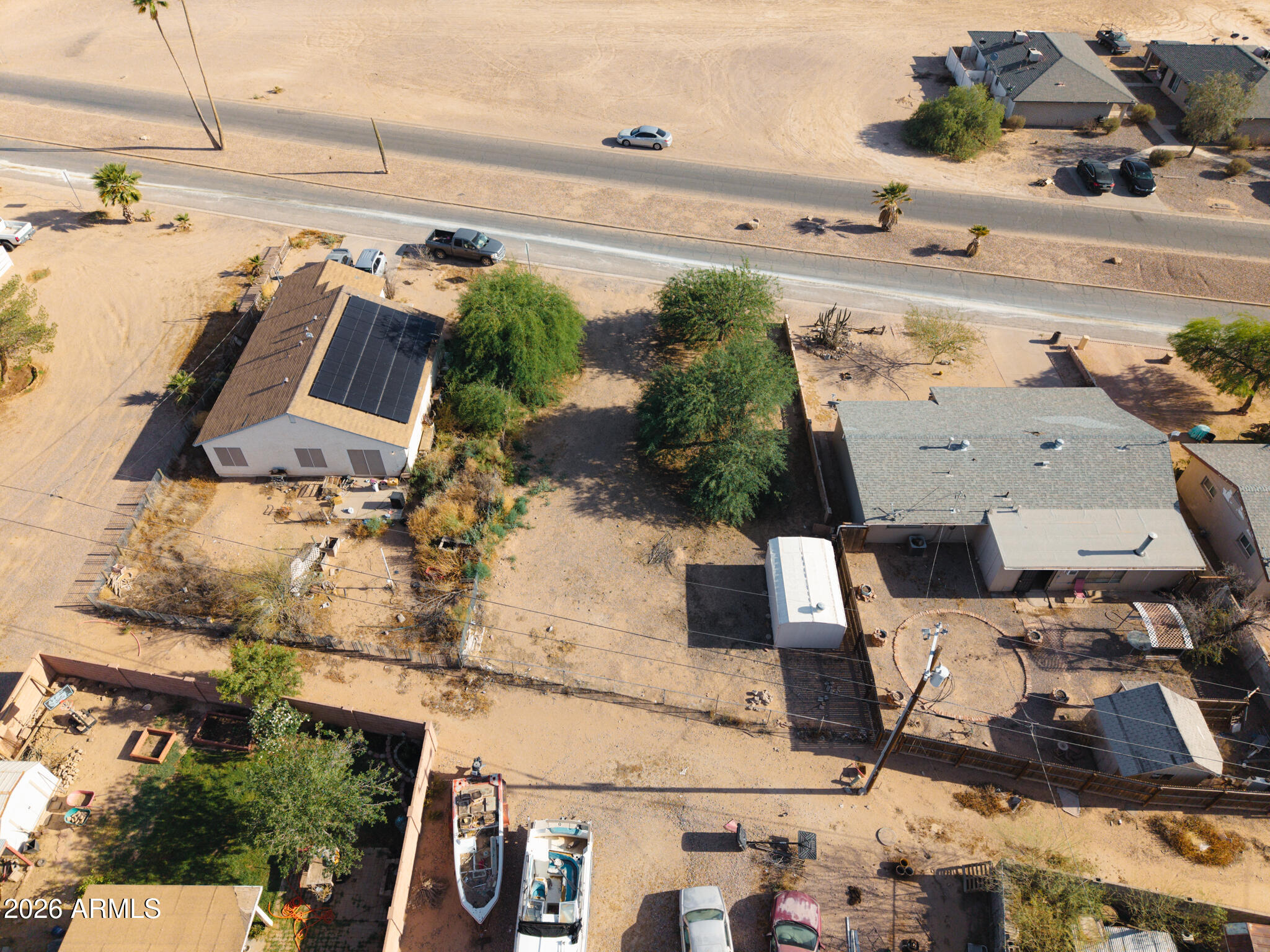 Build-ready residential lot in Arizona City! Approx. 6,478 sq ft with water, electricity, and sewer available, making development easier. Located in an established area with nearby homes and convenient access to local amenities, golf, and main roads. No HOA. Great opportunity to build your new home or hold as an investment in a growing community.