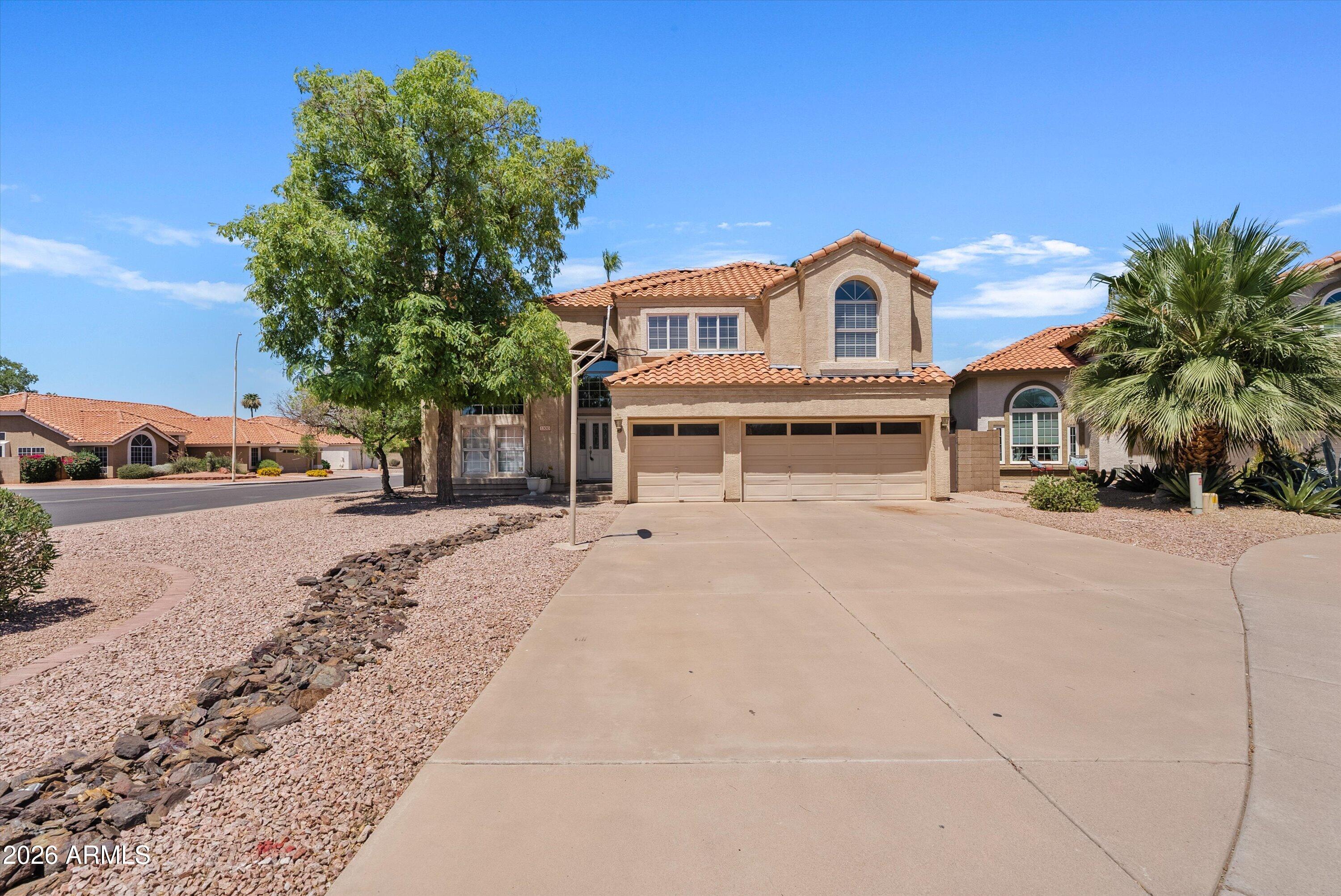 Nestled on a coveted corner cul-de-sac lot in the established Andersen Springs community, this beautiful home delivers the space, upgrades, and location today's buyers are searching for. A brand new roof installed in 2025 provides immediate peace of mind. The primary suite is conveniently located on the main level and features direct French door access to the backyard and pool -- a seamless indoor-outdoor connection. The en suite bath is appointed with a private jetted soaking tub, separate shower, and a secondary door to the backyard. Four additional bedrooms are situated upstairs, offering an ideal layout for families or guests. A dedicated den adds flexible space for a home office or study.
Two wood-burning fireplaces add warmth and character throughout the main living areas. The kitchen has been upgraded with newer countertops and cabinetry and includes all appliances -- truly move-in ready. A sparkling private pool completes the backyard.
Andersen Springs residents enjoy community greenbelts, playgrounds, and walkable access to the elementary school. The location offers exceptional convenience -- situated just minutes from the Intel, Microchip Technology, and NXP Semiconductor campuses, making it an ideal home base for tech professionals. Easy freeway access puts dining, shopping, and the broader East Valley within quick reach.