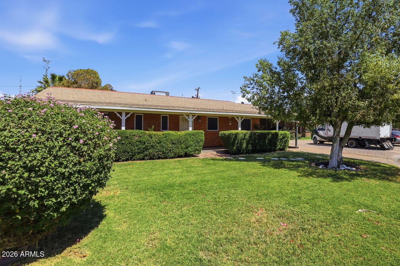 Charming Phoenix Brick Gem with NO HOA! Character, updates & flexibility come together in one smart central Phoenix find near Sky Harbor, major freeways, Papago Preserves, shopping, restaurants & the OG core of Phoenix. Spacious 363 sq ft room addition with cozy fireplace creates standout space for media, games, work, fitness or relaxed entertaining. Updated kitchen & modernized baths bring fresh comfort, while inside utility/laundry room behind carport adds everyday ease. Enjoy Arizona living from welcoming front patio or expansive 240 sq ft covered back patio--perfect for morning coffee, BBQs & shaded outdoor gatherings. Alley-access RV gate offers valuable flexibility for toys, trailers or extra parking. Move-in ready charm, smart updates & connected Phoenix living!