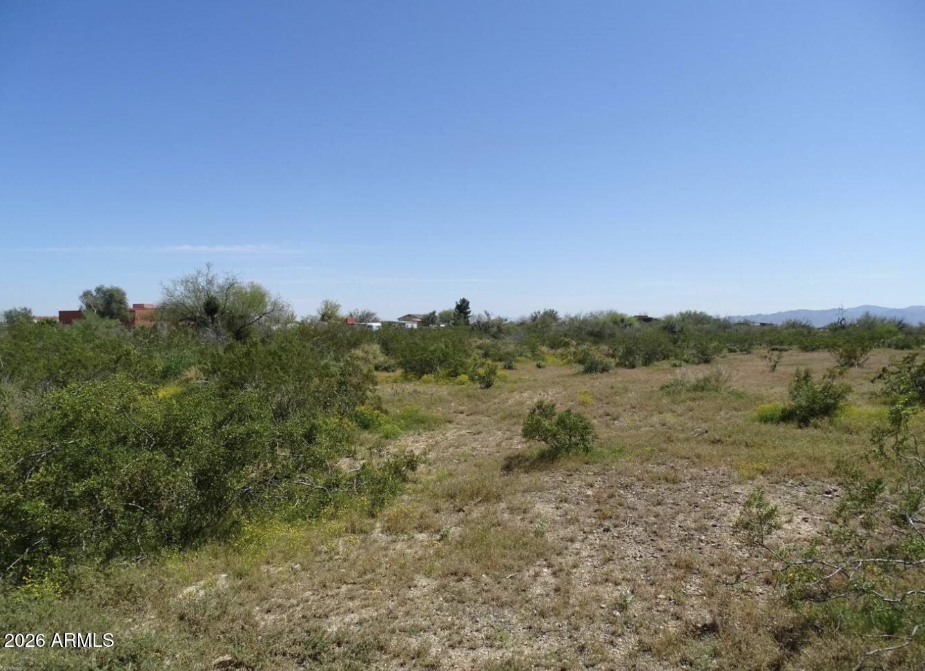 Excellent opportunity to own almost 2.5 acres of horse property in an area of custom built homes.  This lot sits between and across from nicely done custom homes. Build your full-time or winter only residence and have plenty of room to put in a nice horse setup, detached workshop / garage, etc...