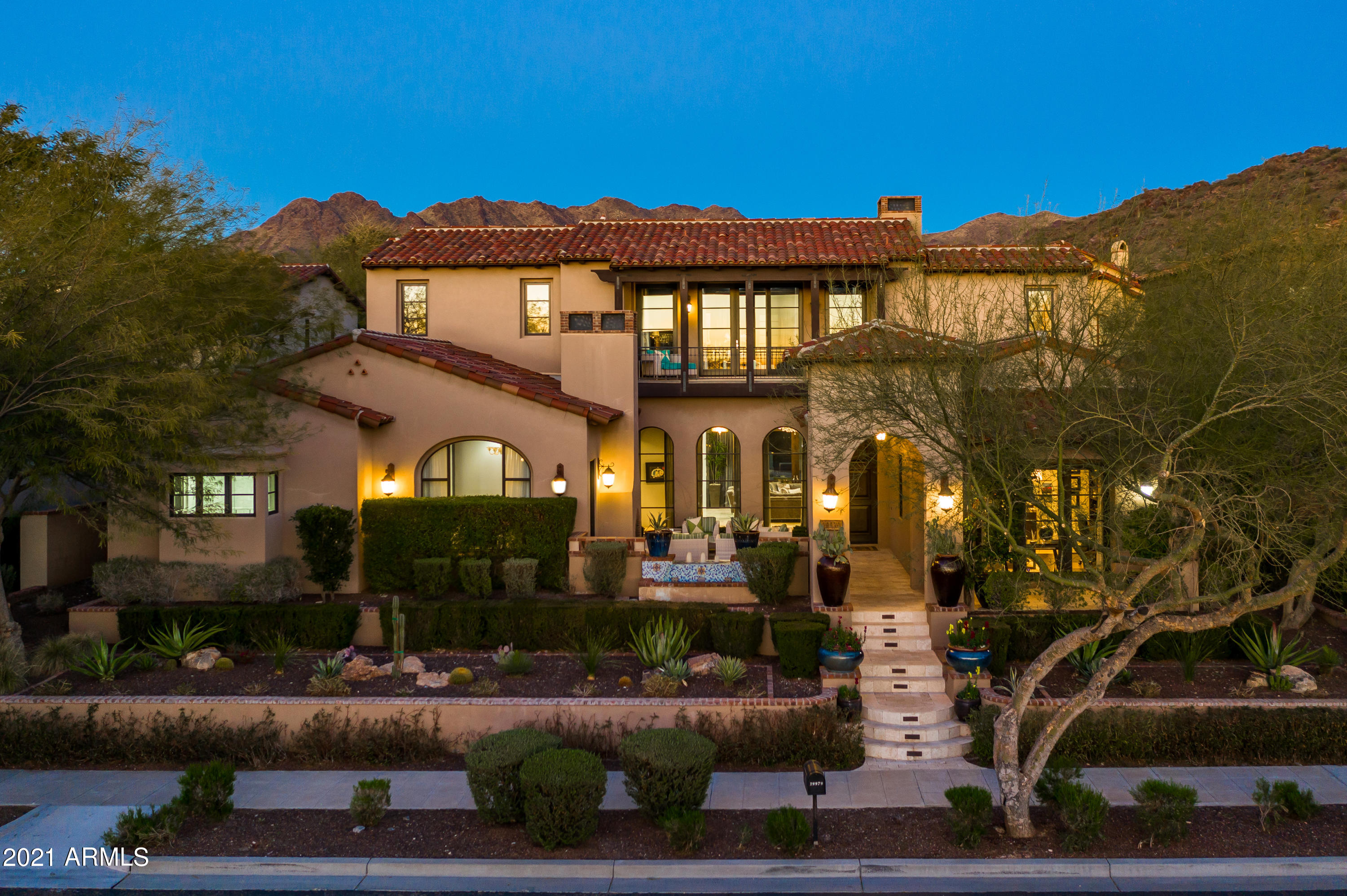 Stunning custom home in the Parks neighborhood of Silverleaf. The open contemporary great room and kitchen area flows magically into a stylish outdoor living space. A backyard oasis featuring a beautiful pool and spa, mature landscaping, a covered loggia, and outdoor kitchen area. Inside you'll love to entertain with this gourmet kitchen complete with Wolf/Subzero appliances and a large island. Enjoy the Arizona sunsets from your front patio area while listening to the soothing sound of water falling next to a warm fire. The main level owners suite has it's own fireplace in addition to a gorgeous bathroom with a walk-in shower, his and her vanities, and a large walk-in closet. Upstairs loft opens to two different balconies each with unique breathtaking views. Your Arizona Dream Home!