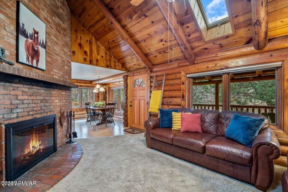 Nestled in the tall pines on Billy Creek and situated on two lots totaling approximately 1.39 acres, this beautifully crafted 4-bedroom, 3-bathroom log cabin offers the perfect blend of peaceful seclusion and everyday convenience. Whether you're looking for a full-time residence, a weekend family getaway, or a prime investment opportunity, this property has it all. Enjoy the soothing sounds of the creek that runs along the edge of the property as you relax on the spacious deck or gather around a firepit under the stars. Inside, warm wood finishes and an inviting open layout create a cozy yet functional living space, ideal for entertaining or just unwinding after a day in nature. The property offers room to breathe, space to explore, and the true feeling of being away from it all yet it's still within easy reach of town amenities and outdoor adventure. Don't miss this rare opportunity to own a slice of mountain paradise!