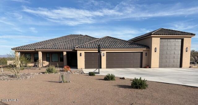 Custom home built in 2025 with 3 bedroom (plus an office), 1.75 bath (plus powder room), and oversize 3 car garage w/ RV garage.  This recently built 2305 square foot home sits on 1.61 acres in the Listening Hills subdivision with awesome views. The kitchen is equipped with a large island, walk-in pantry, stainless steel appliances, 36″ gas range, and quartzite countertops. Kropf custom cabinetry in kitchen, closets, laundry, and bathrooms. Dual sinks and walk-in shower in master bathroom. House and garages are spray foam insulated. Synthetic colored stucco on the exterior. Low maintenance desert landscaping with drip system and artificial turf.