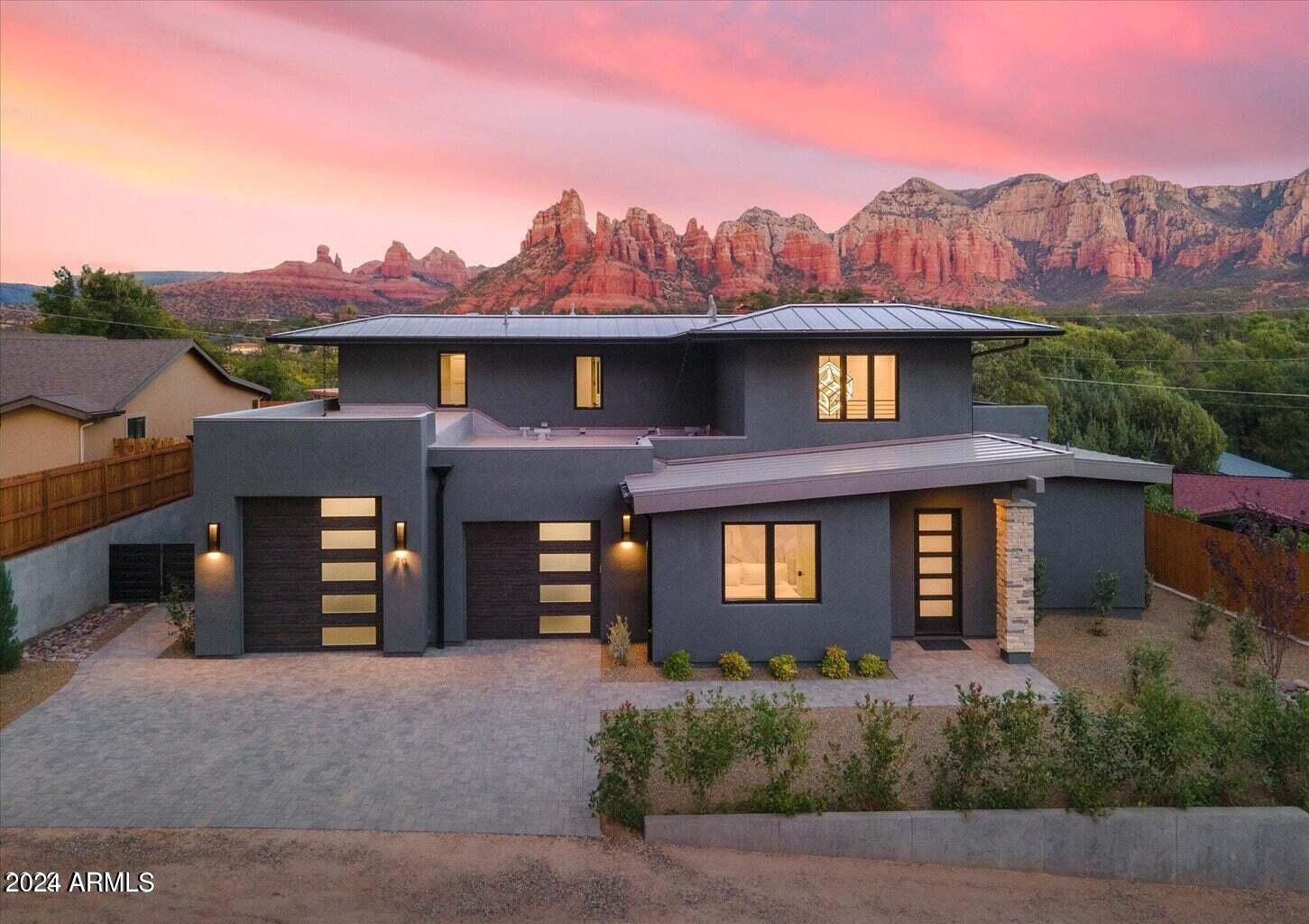 *** STR performing with over $700k worth of reservations from October 2023 until July 2026... and that's with the owner using it once a month!!! ***
Step into luxury living with this exquisite 7-bedroom, 5-bathroom home, perfectly situated in the heart of Sedona with NO HOA! Boasting a modern design, this property is a true entertainer's dream, offering the perfect blend of sophistication and comfort.
As you enter through the grand foyer, you'll be greeted by a spacious open-concept great room and kitchen, creating a seamless flow for social gatherings. The split floor plan ensures privacy, with the primary bedroom boasting a luxurious walk-in shower, deluxe soaking tub and also features a spacious walk-in closet. The primary also has direct access to the pool area.