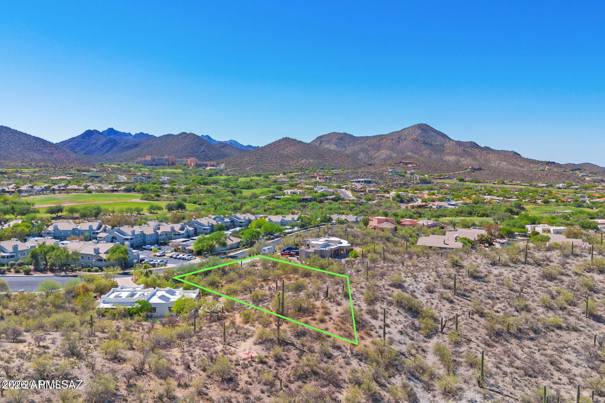 Wake up to glowing desert sunrises and unwind each evening beneath breathtaking Arizona sunsets from this stunning 0.8-acre homesite in Canyon View, one of West Tucson's most scenic communities nestled within Starr Pass. This exceptional property captures sweeping mountain, sparkling city lights, and endless Sonoran Desert views in every direction. Surrounded by natural beauty and peaceful desert landscapes, this homesite offers the perfect canvas for a custom retreat while being only minutes from world-class golf, hiking trails, dining, and downtown Tucson. With low HOA dues and an unbeatable westside location, this is a rare opportunity to build your vision in a setting where dramatic scenery and desert tranquility come together effortlessly.
