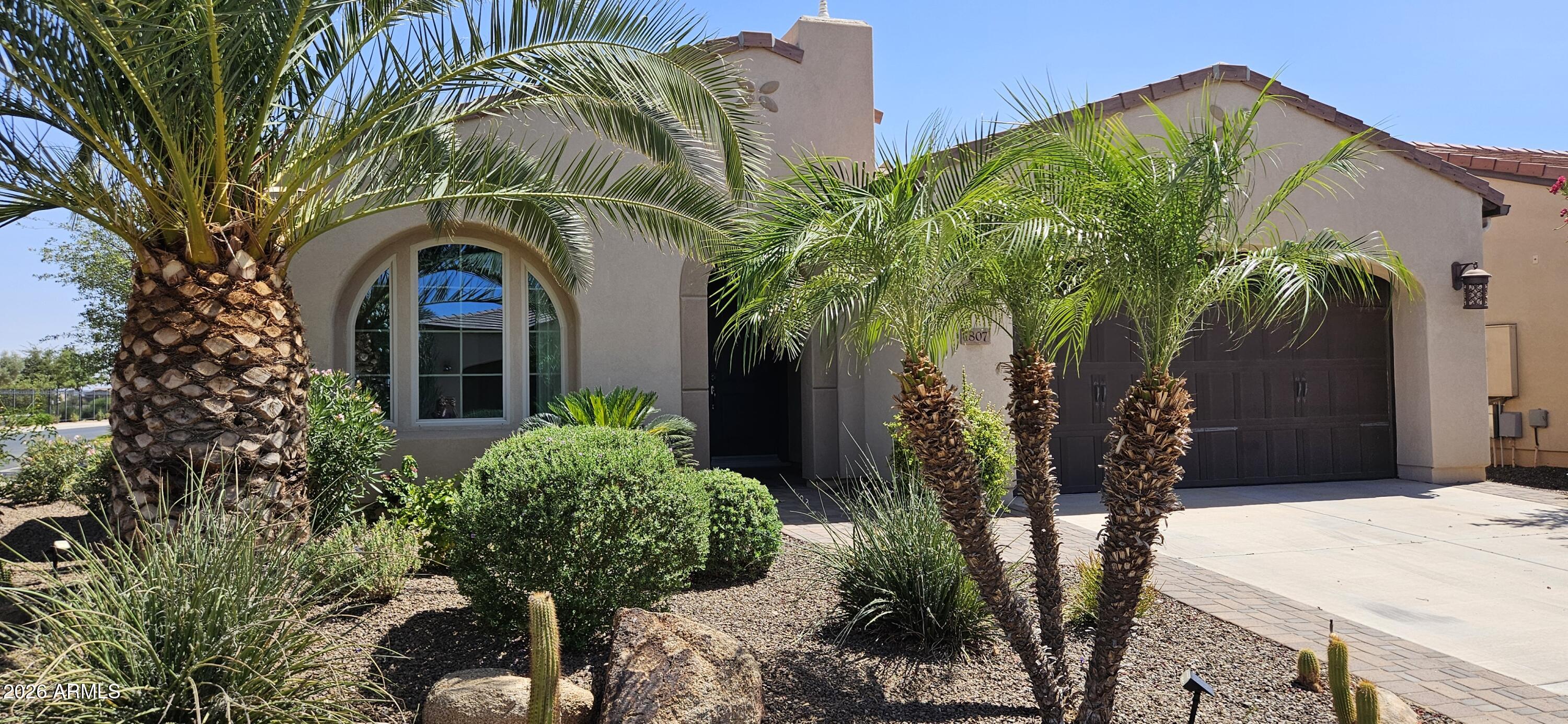 Welcome to your new happy place in beautiful Encanterra!  This St. Tropez split floor plan sits on an oversized corner lot surrounded by meticulously lush landscaping.  Enjoy entertaining in the amazing private fenced backyard with travertine tile, BBQ and covered patio with electromechanicall sunshades.  Many upgrades inside, including a beautiful Gourmet kitchen, a Rolling Wall of Glass looking out at backyard, new LED lighting, rich handsome cabinetry, newer Hunter Douglas plantation shutters, and tile throughout.  The Community Center/Clubhouse offers 2 outdoor pools and 1 indoor pool, all heated, gym, aerobics/dance floor, a smoking room and card room, and a spa for nails, hair, etc and a barber in the men's locker room. Also there is a craft & class center, an outdoor concert area, pickleball, and bars and restaurants.  The solar energy system offsets electric bill costs (prepaid lease paid by Builder in 2014).  Your visit to this remarkable home will not disappoint!