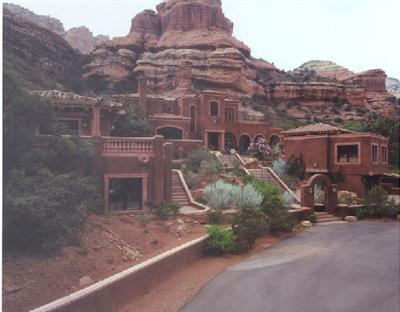 Beatifully Situated At The Back Of Echantment Resort In A World Class Setting On A Private Cul De Sac. Borders On National Fores Residence Has 3607 Sq Ft In Main House With Two Guest Casitas With An Exercise Studio Call Listing Agent To Show