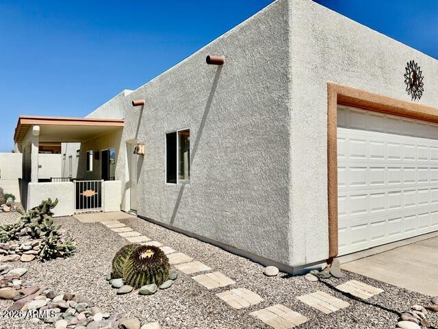 Desirable corner lot in a vibrant 55+ active adult resort community! Monthly resort fee includes property taxes, trash service, pickleball courts, dog park, clubhouse activities, fitness center, heated pool & spa, potlucks, EV charging stations, and so much more. This beautifully maintained 2 bedroom, 2 bathroom home plus DEN offers an ideal floorplan with abundant natural light and comfortable living spaces throughout. Enjoy outdoor living year-round with TWO covered patios, sunscreens for added efficiency and privacy, and a premium location next to convenient overflow parking. Just a short stroll to the clubhouse and community amenities where neighbors become friends and every day feels like a vacation. Experience the perfect blend of comfort and gated resort living. LOVE your lifestyle!