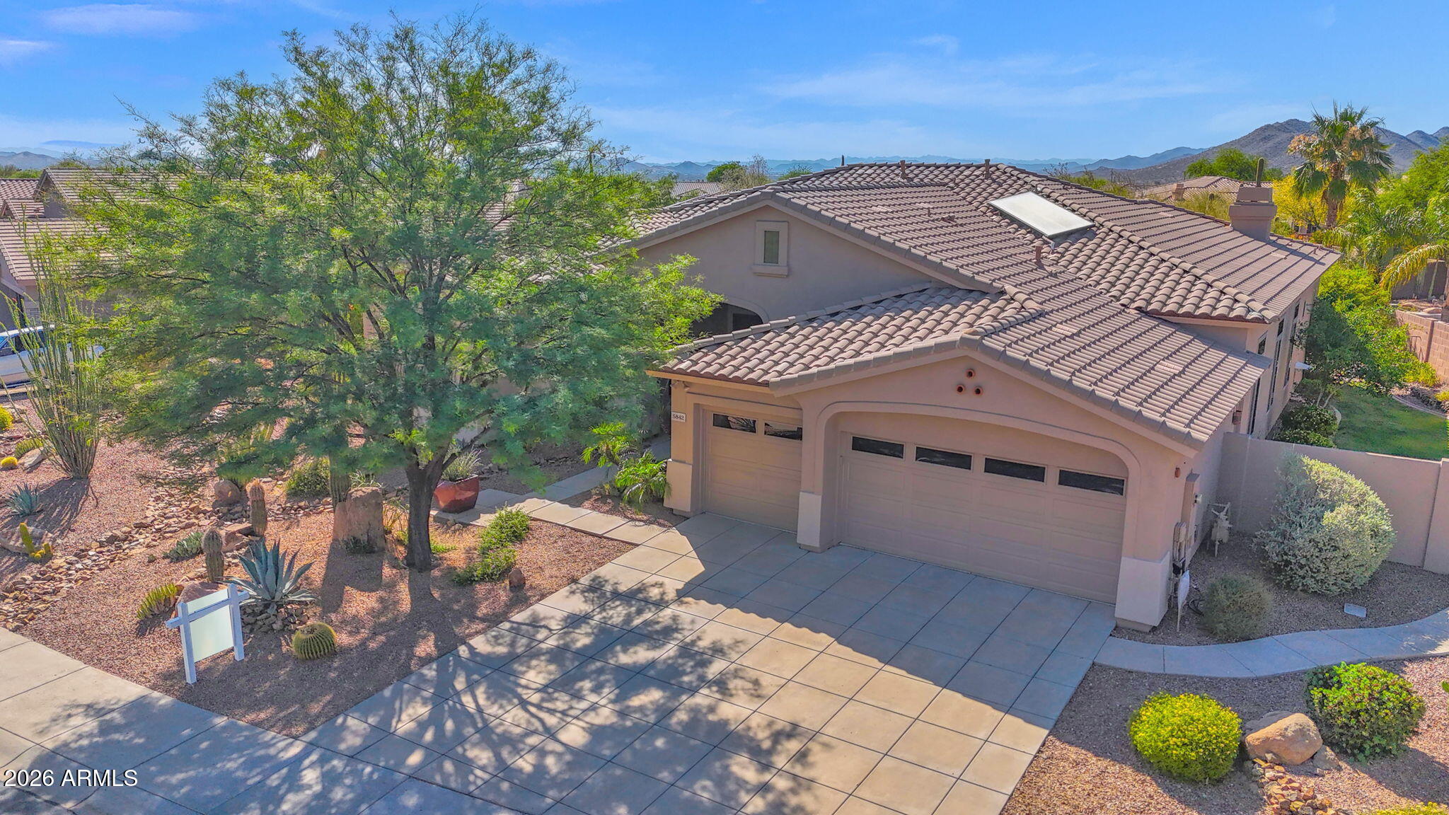 Nestled in the highly desirable Los Alisos community of North Scottsdale, this beautifully designed 4-bedroom, 3.5-bath home offers the perfect blend of comfort, privacy, and Arizona outdoor living. Located in a quiet gated neighborhood just minutes from the YMCA and within walking distance to Cactus Shadows High School, this home is ideally situated near the charm of Carefree Town Center and the restaurants, shopping, and western character of Cave Creek.

Inside, the spacious floor plan features four generous bedrooms, 3.5 bathrooms, and a versatile den or office perfect for working from home, a playroom, or additional living space. The home was designed for both everyday living and entertaining, with inviting indoor spaces that flow seamlessly to the backyard retreat. Step outside to your own private resort-style setting complete with a sparkling pool and spa, covered outdoor living area, built-in BBQ, and a lush natural grass yard ideal for kids and pets. Whether hosting guests or enjoying peaceful desert evenings, the backyard captures the essence of North Scottsdale living.

Set within the gated Los Alisos enclave known for its privacy and convenient access to schools, recreation, golf, hiking, dining, and shopping, this home offers the rare combination of tranquility and accessibility in one of Scottsdale's most sought-after locations.