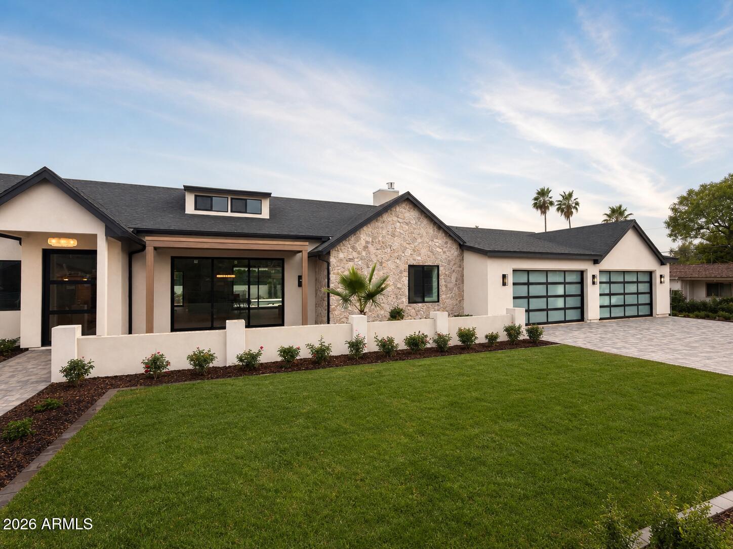Located in the sought-after Marion Estates neighborhood, this 5-bedroom, 4.5-bath residence with a rare 4-car garage pairs timeless sophistication with the warmth and functionality today's families want most. The home opens to expansive living spaces filled with natural light, flowing effortlessly into a stunning kitchen with natural stone countertops, a substantial island with seating and storage, and a large butler's pantry that elevates both daily living and entertaining. Thoughtfully curated finishes add richness and character throughout, creating a home that feels elegant, current, and deeply comfortable. Privately set apart, the primary suite offers a luxurious sense of escape with a generous spa-inspired bath, an extraordinary closet, and captivating Camelback  Mountain views. The.. backyard is equally memorable, with a diving pool and direct views of the Praying Monk, creating an outdoor setting that is as iconic as it is inviting. This is a home that delivers style, comfort, and the kind of everyday experience that makes family life feel exceptional.