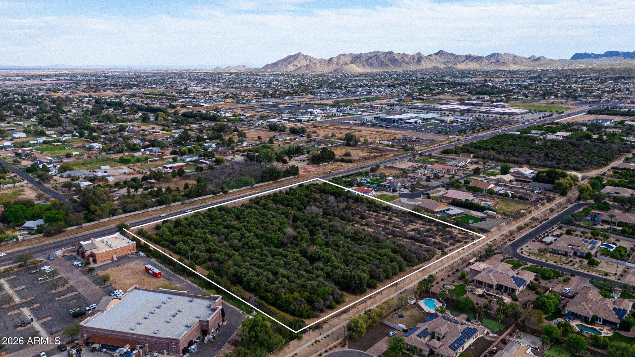 Prime Investment Opportunity: 8.835 Acres of Orange Grove Land Between Gilbert and Queen Creek 

Seize this rare chance to invest in 8.835 acres of thriving orange grove, strategically located between Gilbert & Queen Creek. With R-43 rural zoning, this property allows for up to 8 homes, making it ideal for investors & developers seeking to create luxury estates or a residential community.  It is also perfect for commercial or multifamily, assisted living, schools, churches, and other enterprises.

This property features easy access to major highways, shopping, & dining, while offering the charm of agricultural beauty. The established orange grove enhances the landscape, presenting a tranquil setting for development.